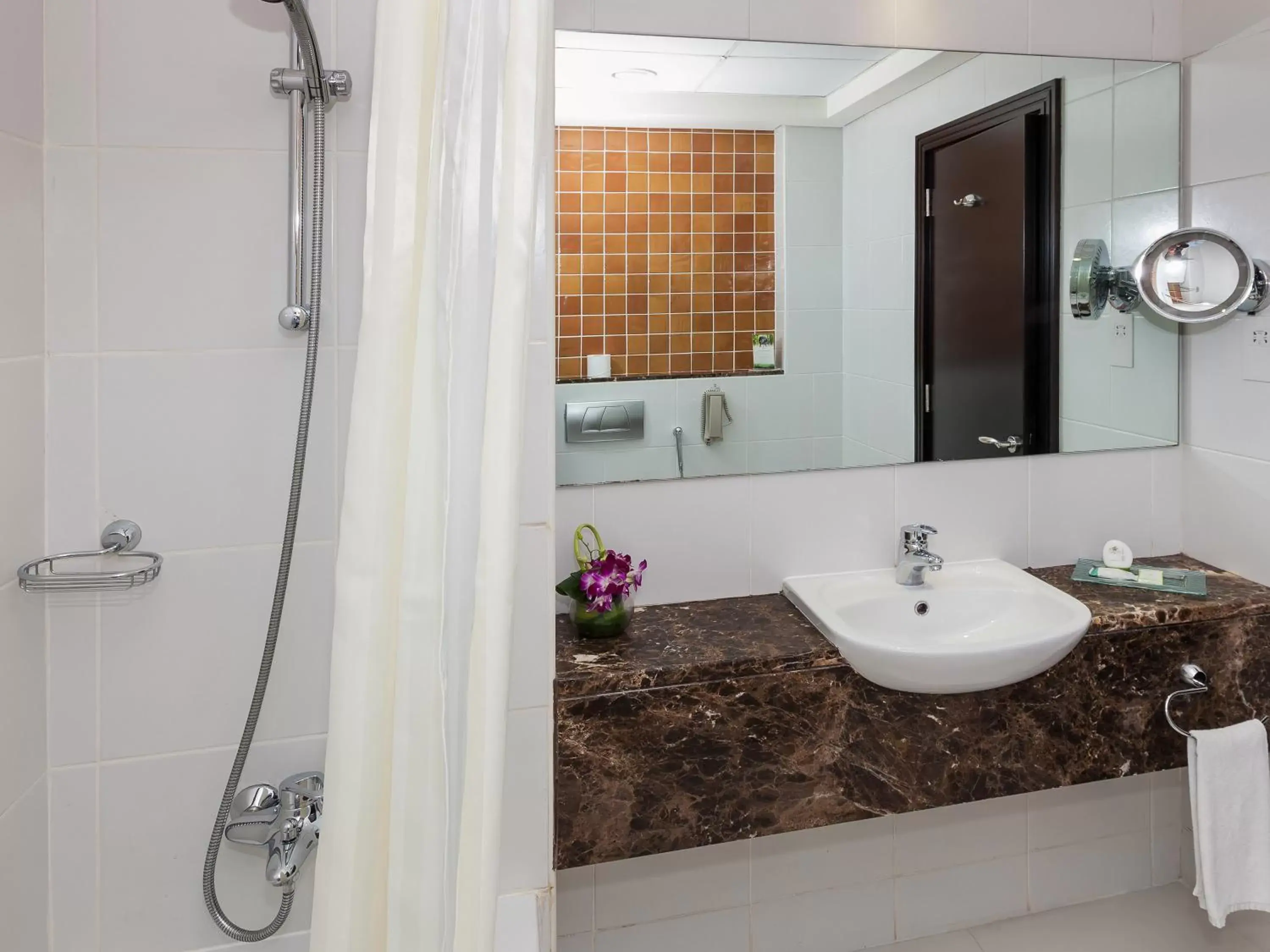 Bathroom in Flora Creek Deluxe Hotel Apartments