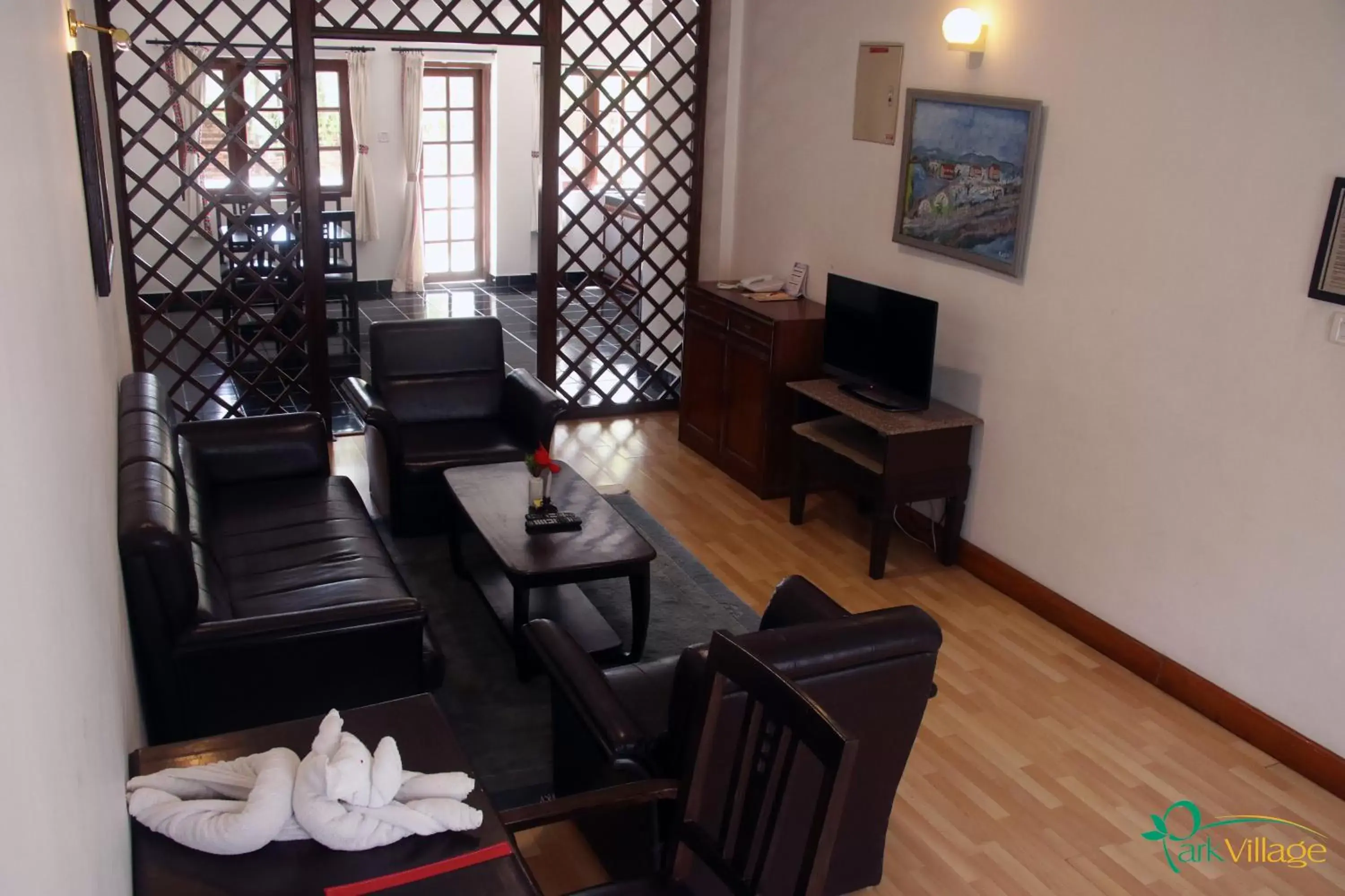 Living room in Park Village Resort by KGH Group