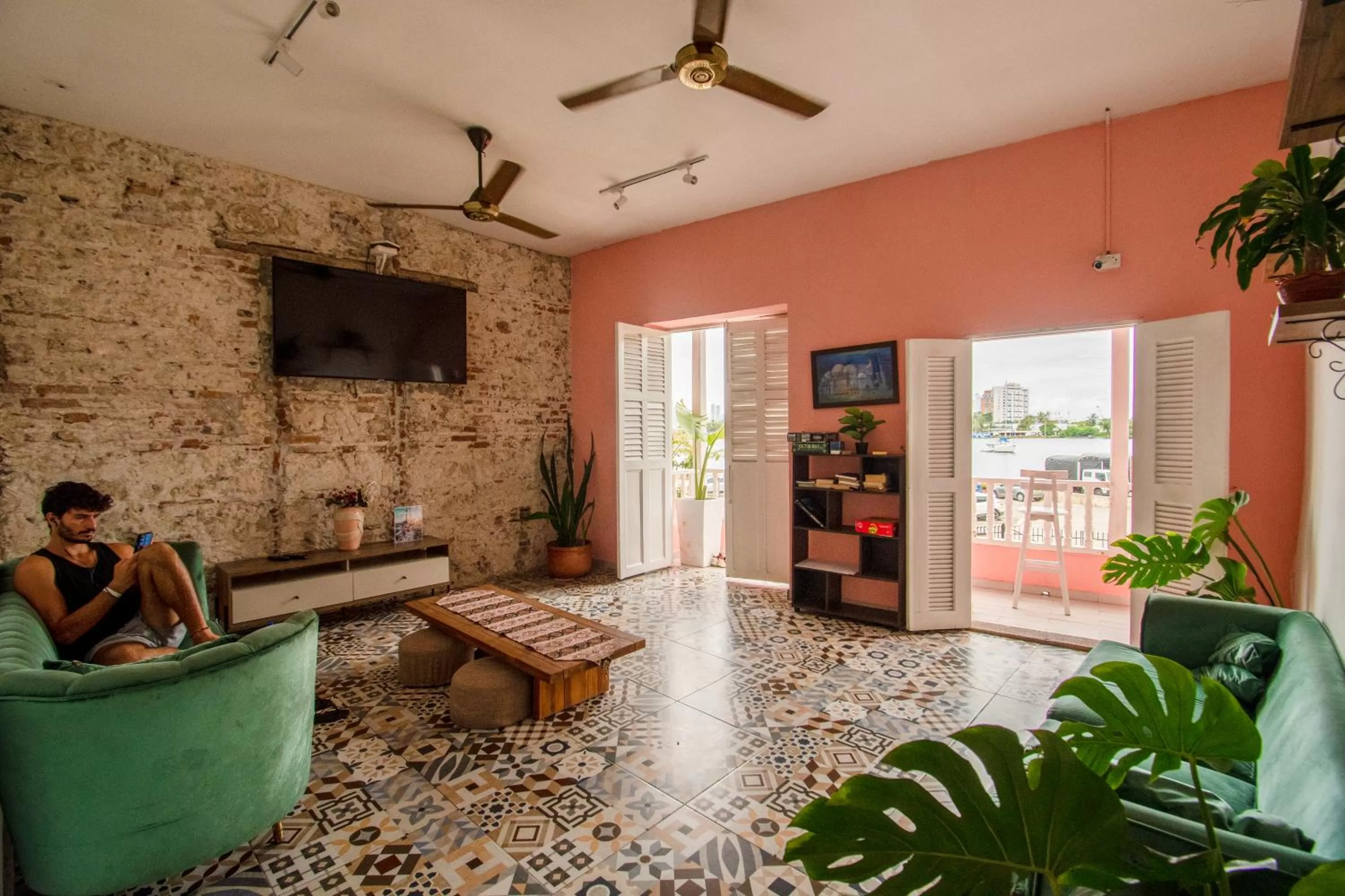 Communal lounge/ TV room in Casa Zahri Boutique Hostel