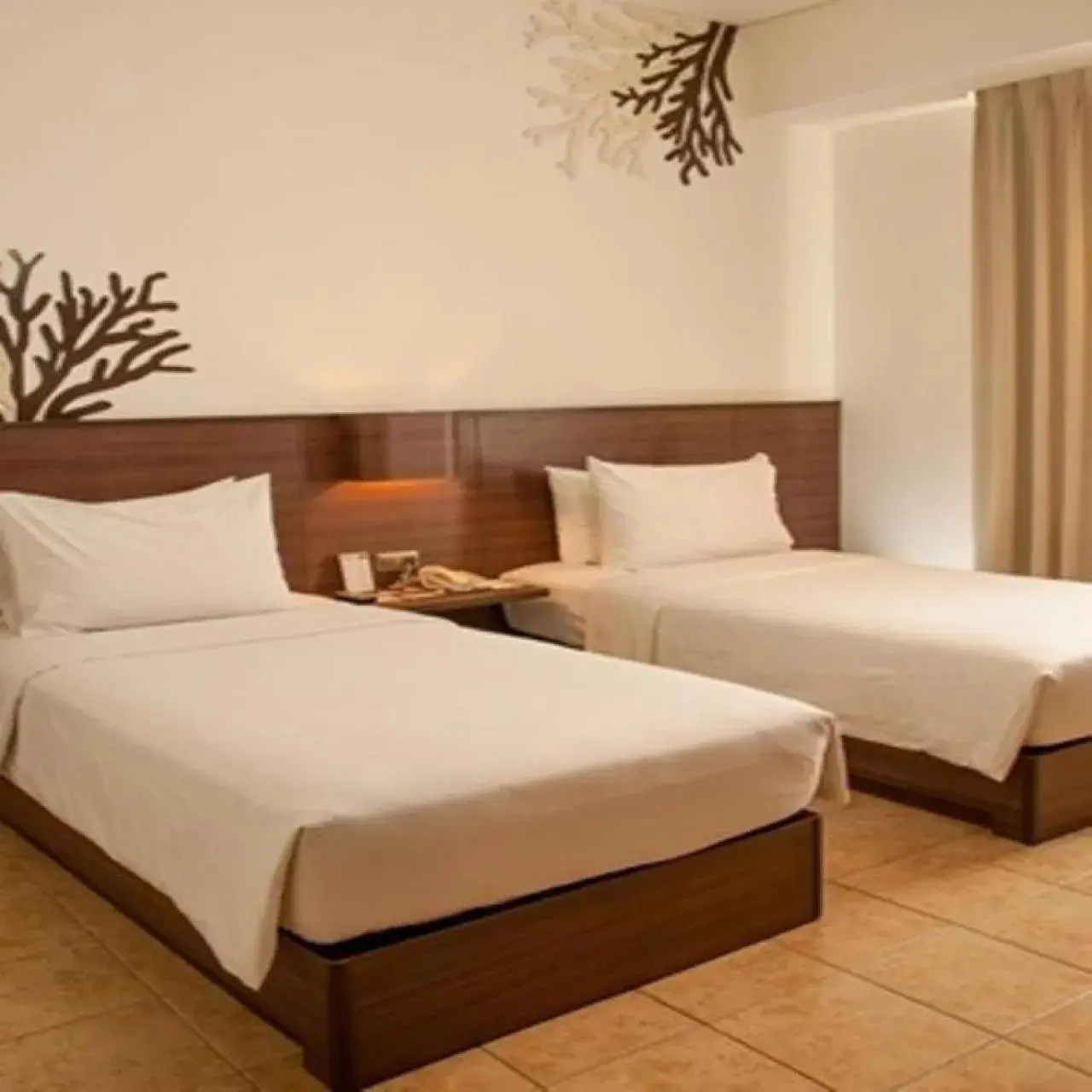 Bed in Hotel Santika Bangka
