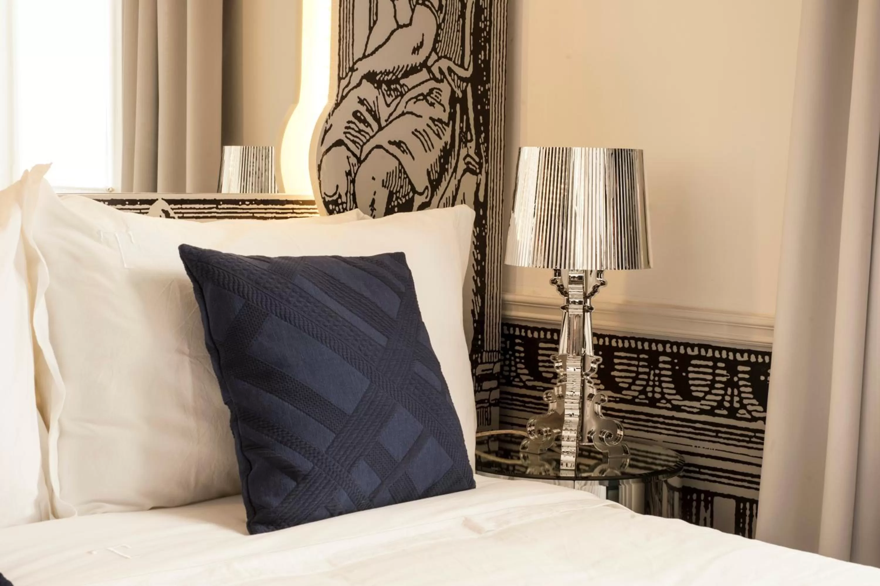 Bed in Teatro Boutique Rooms & Suites