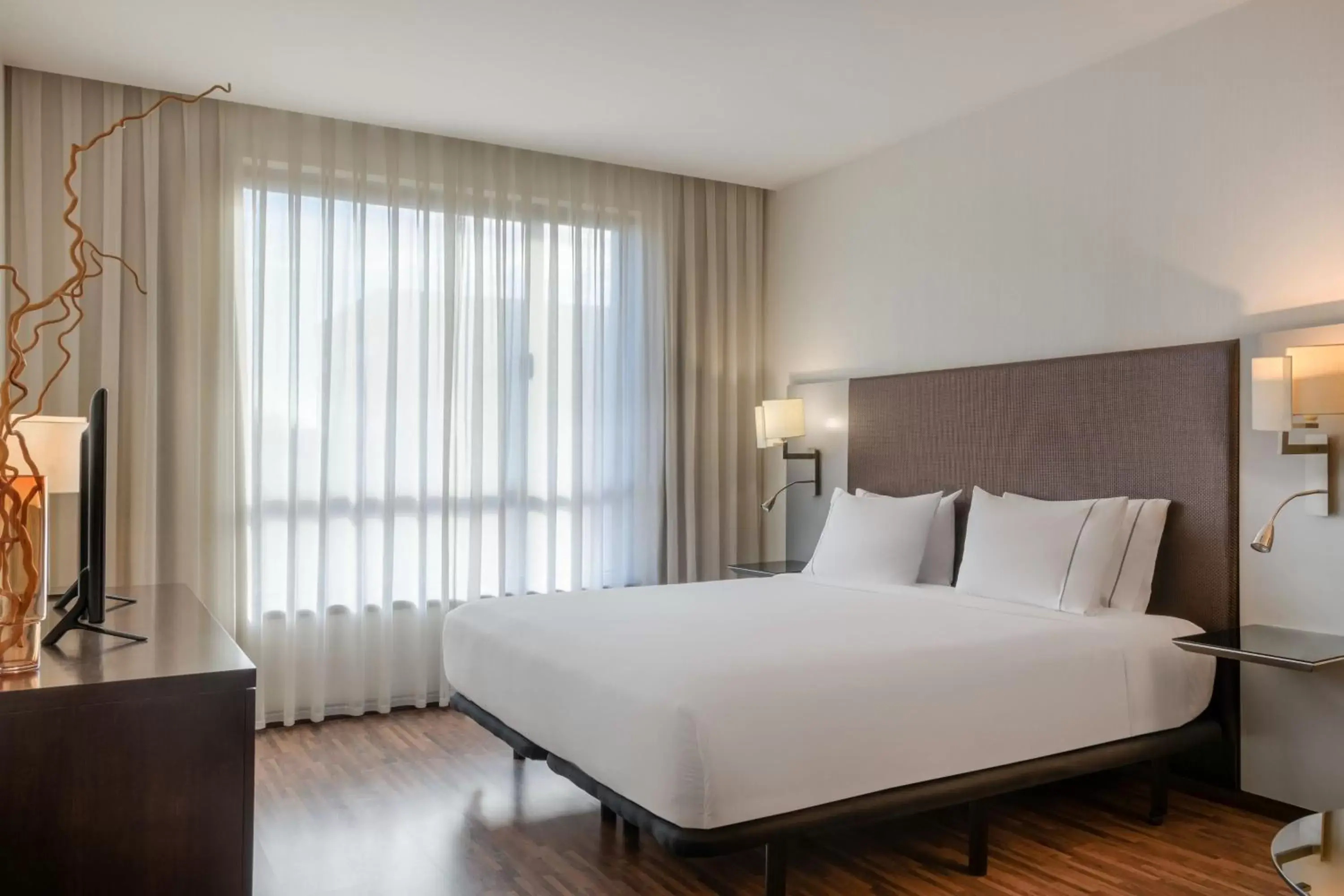 Photo of the whole room, Bed in AC Hotel Coslada Aeropuerto by Marriott