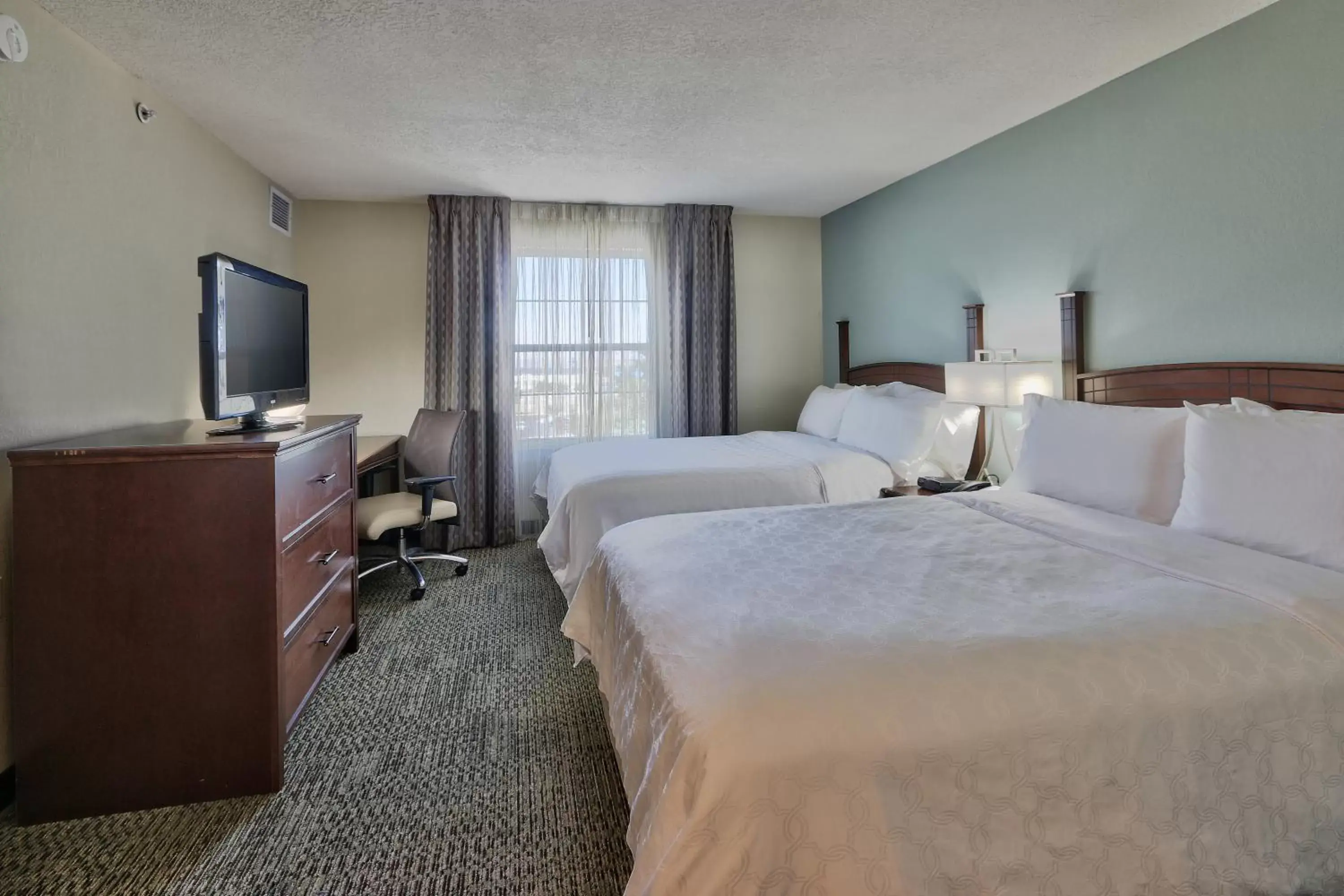Bed in Staybridge Suites Albuquerque North, an IHG Hotel