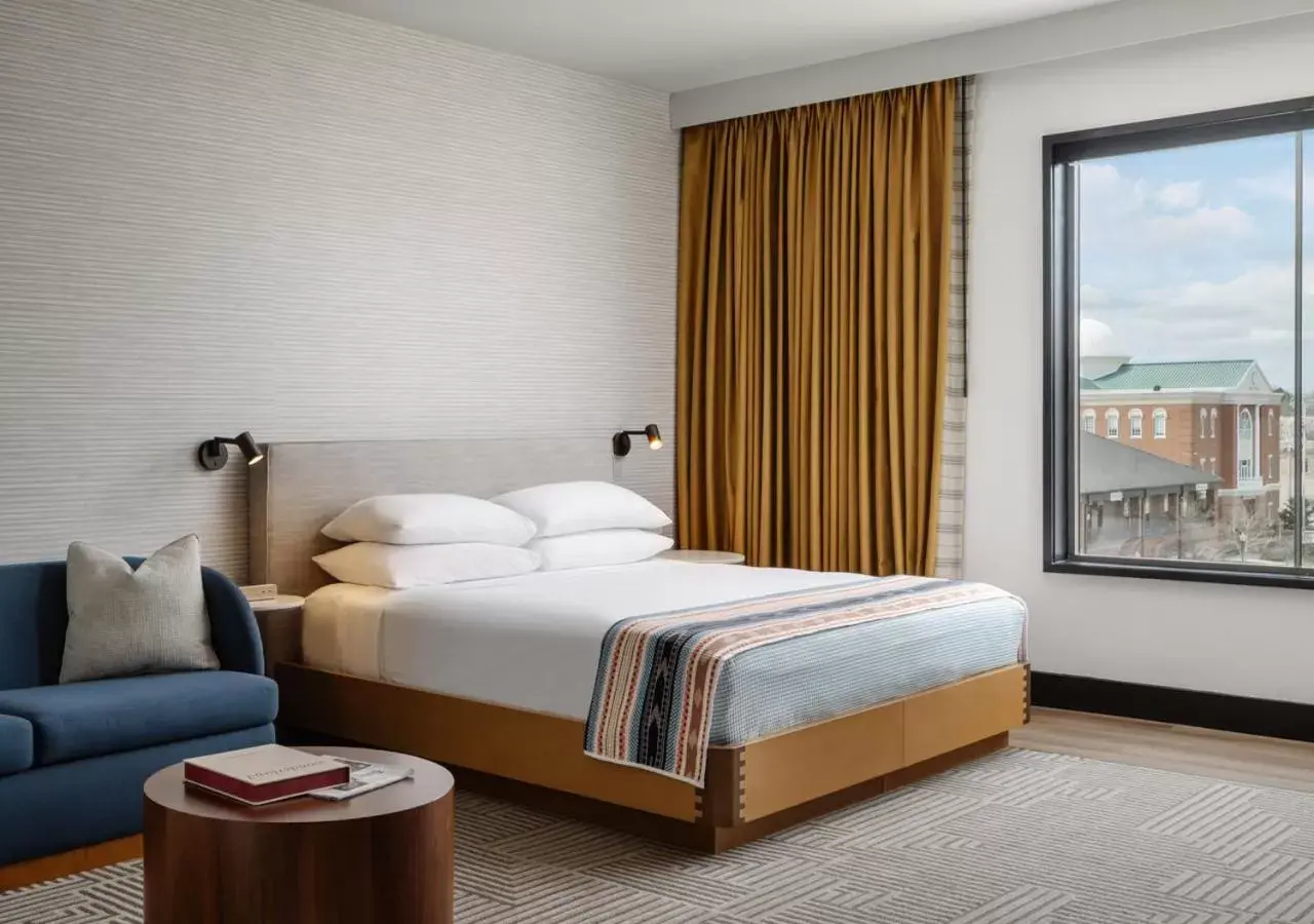 Bed in Hotel Tupelo, a Wyndham Hotel