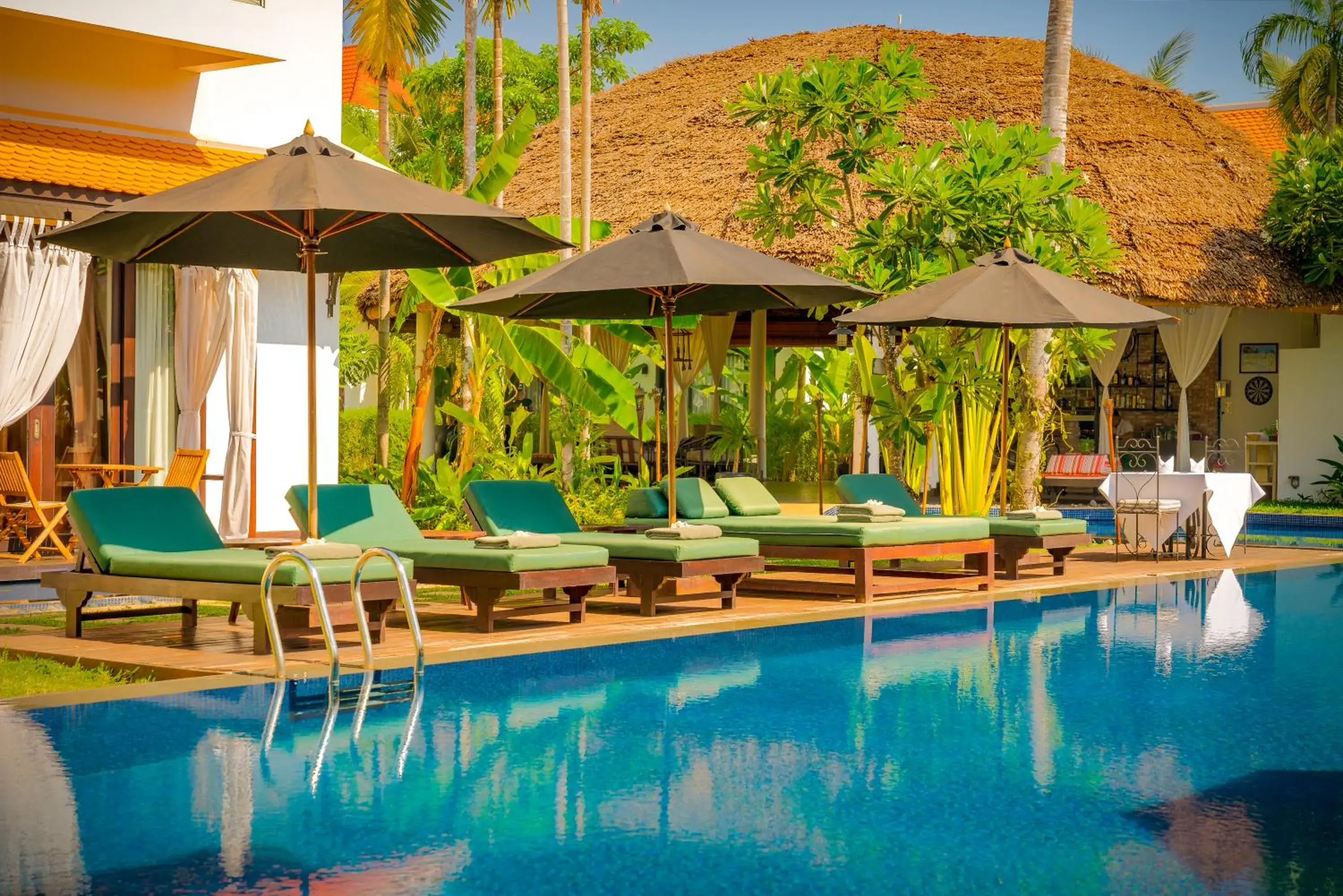 Lounge or bar, Swimming Pool in The Embassy Angkor Resort & Spa