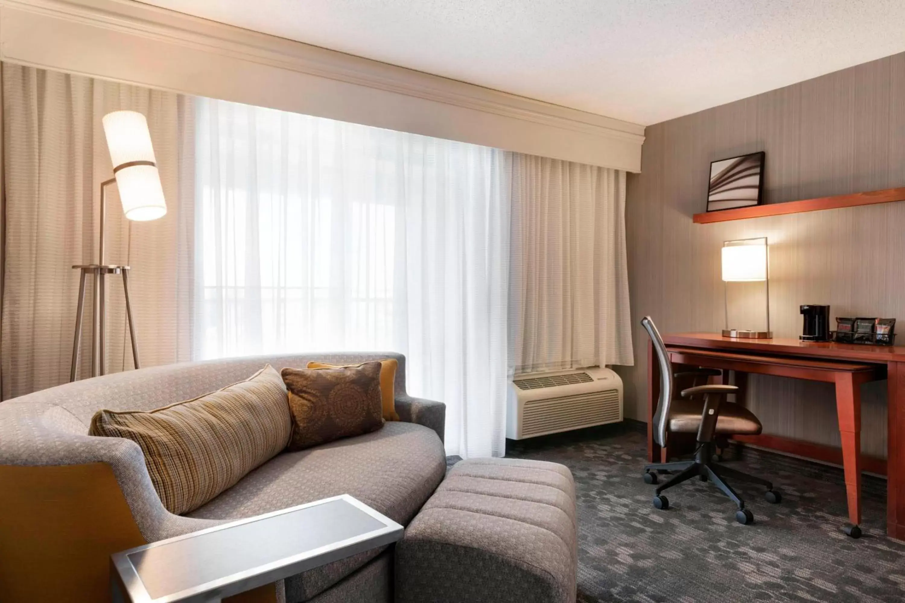 Photo of the whole room, Seating Area in Courtyard by Marriott Bloomington Normal