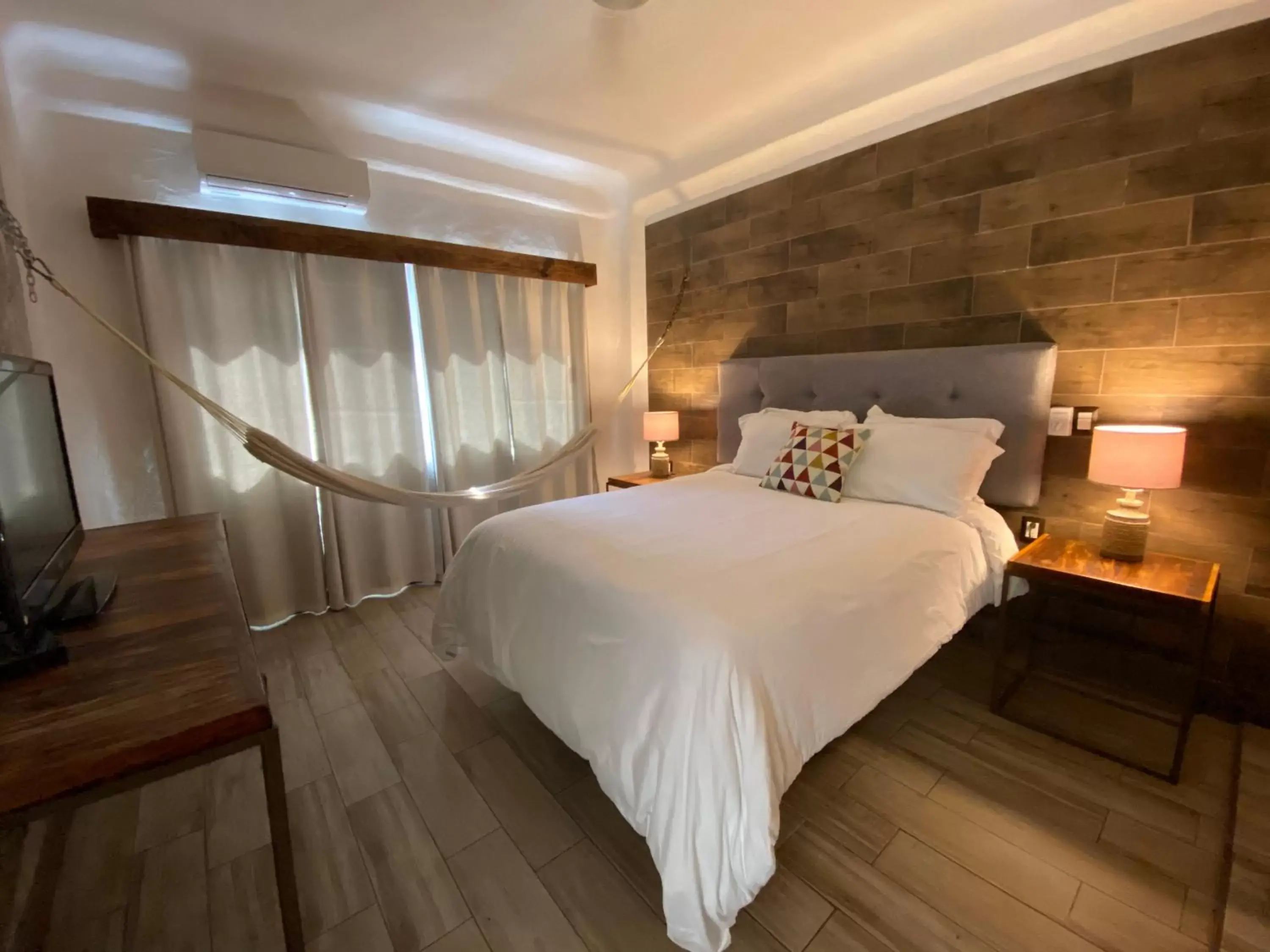 Photo of the whole room, Bed in Hotel Amaca Puerto Vallarta - Adults Only