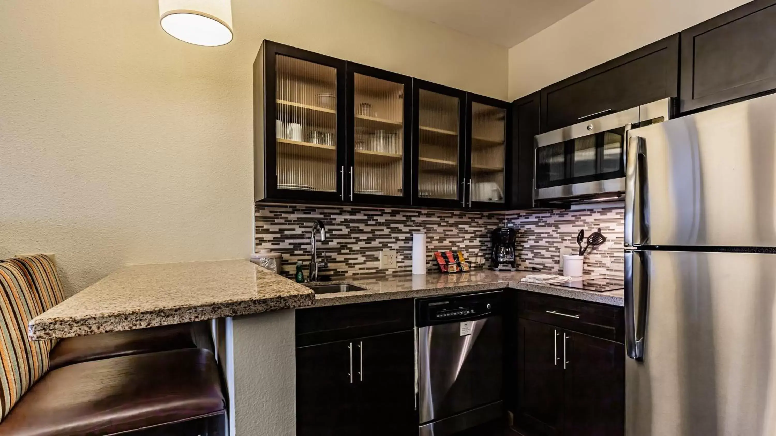 Photo of the whole room, Kitchen/Kitchenette in Staybridge Suites Laredo, an IHG Hotel