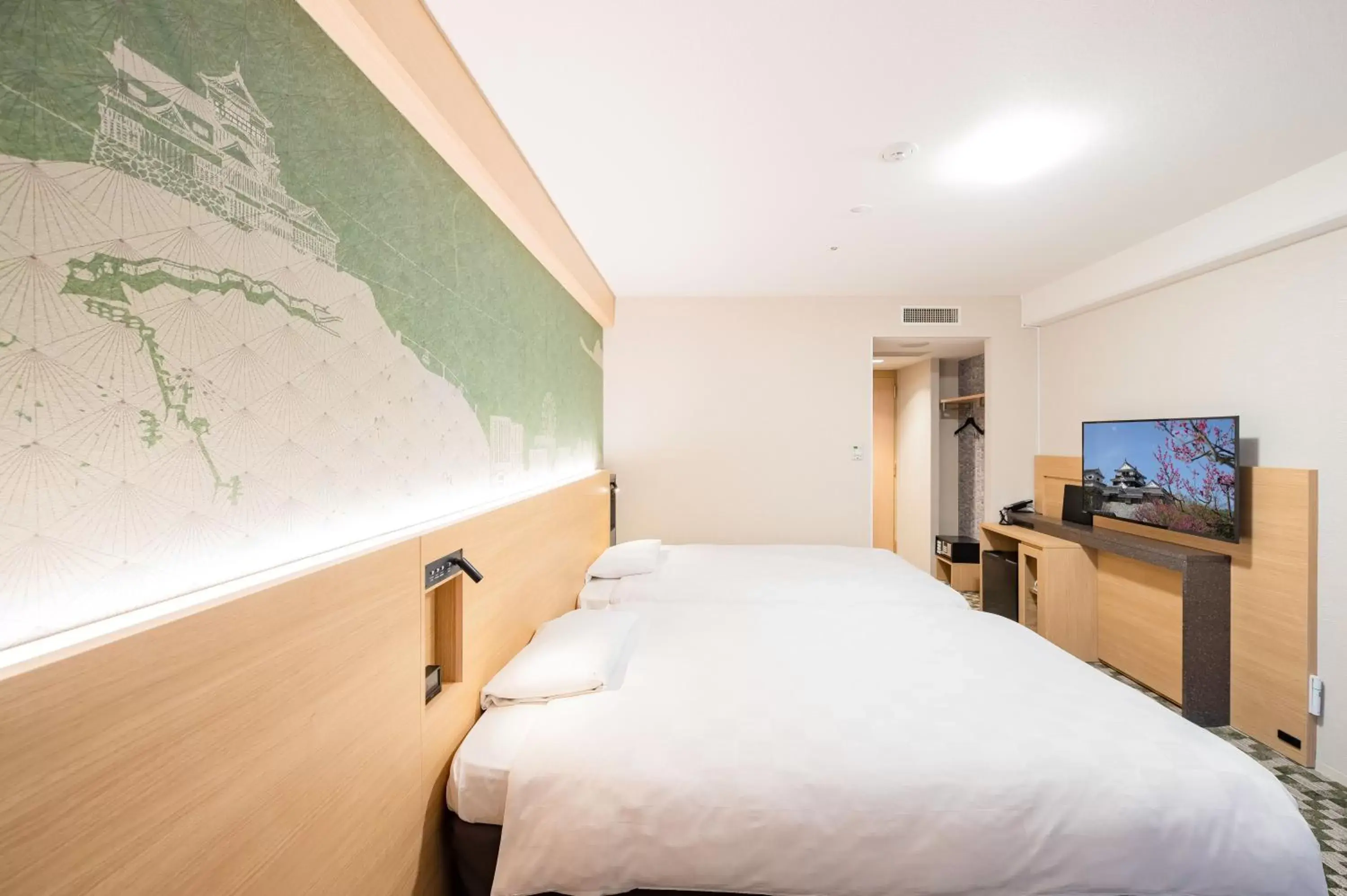 Bed in Matsuyama Tokyu REI Hotel Bed in Matsuyama Tokyu REI Hotel