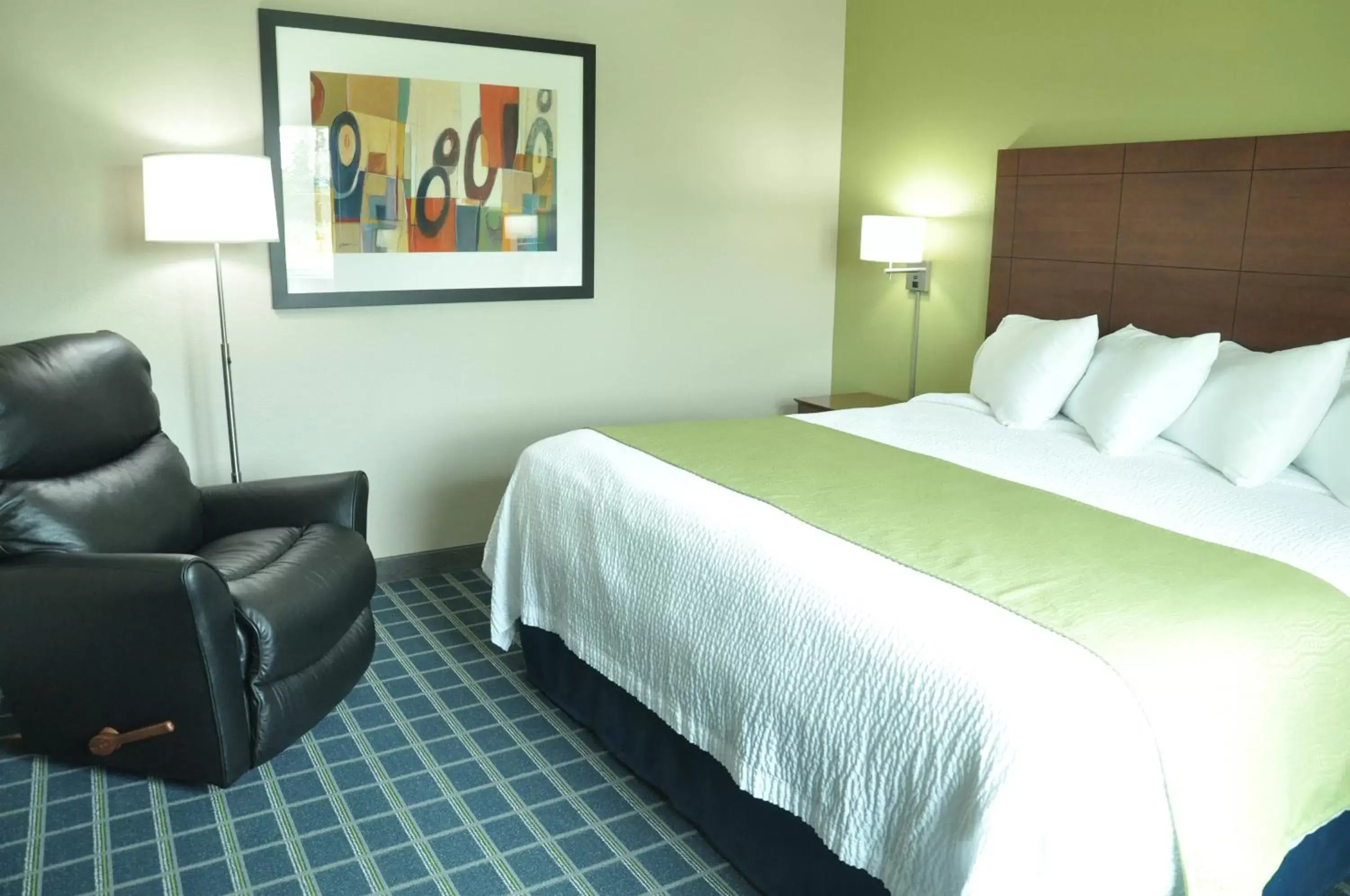 Bed in Brookstone Lodge & Suites Bed in Brookstone Lodge & Suites