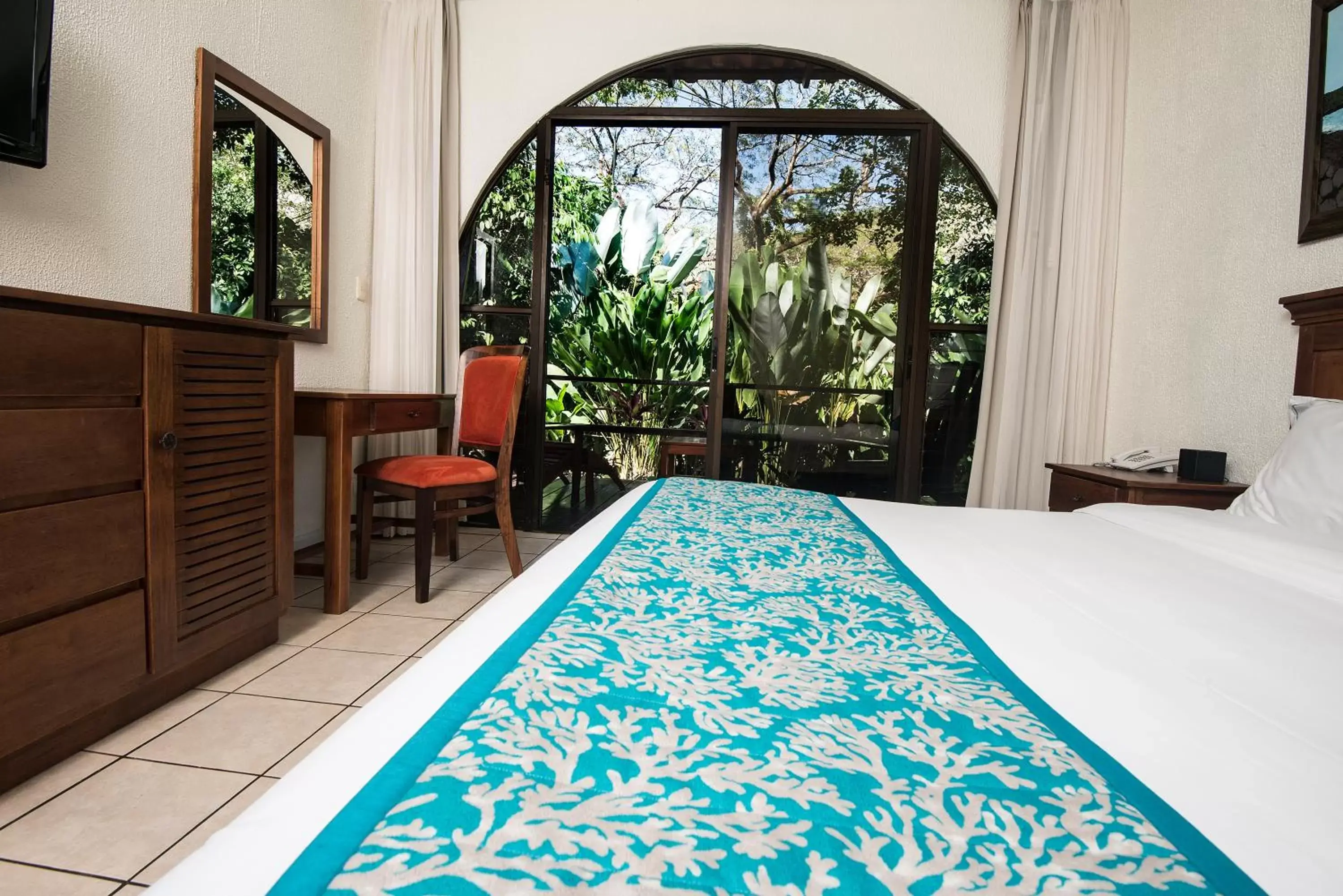 Bed, Swimming Pool in Hotel Punta Leona