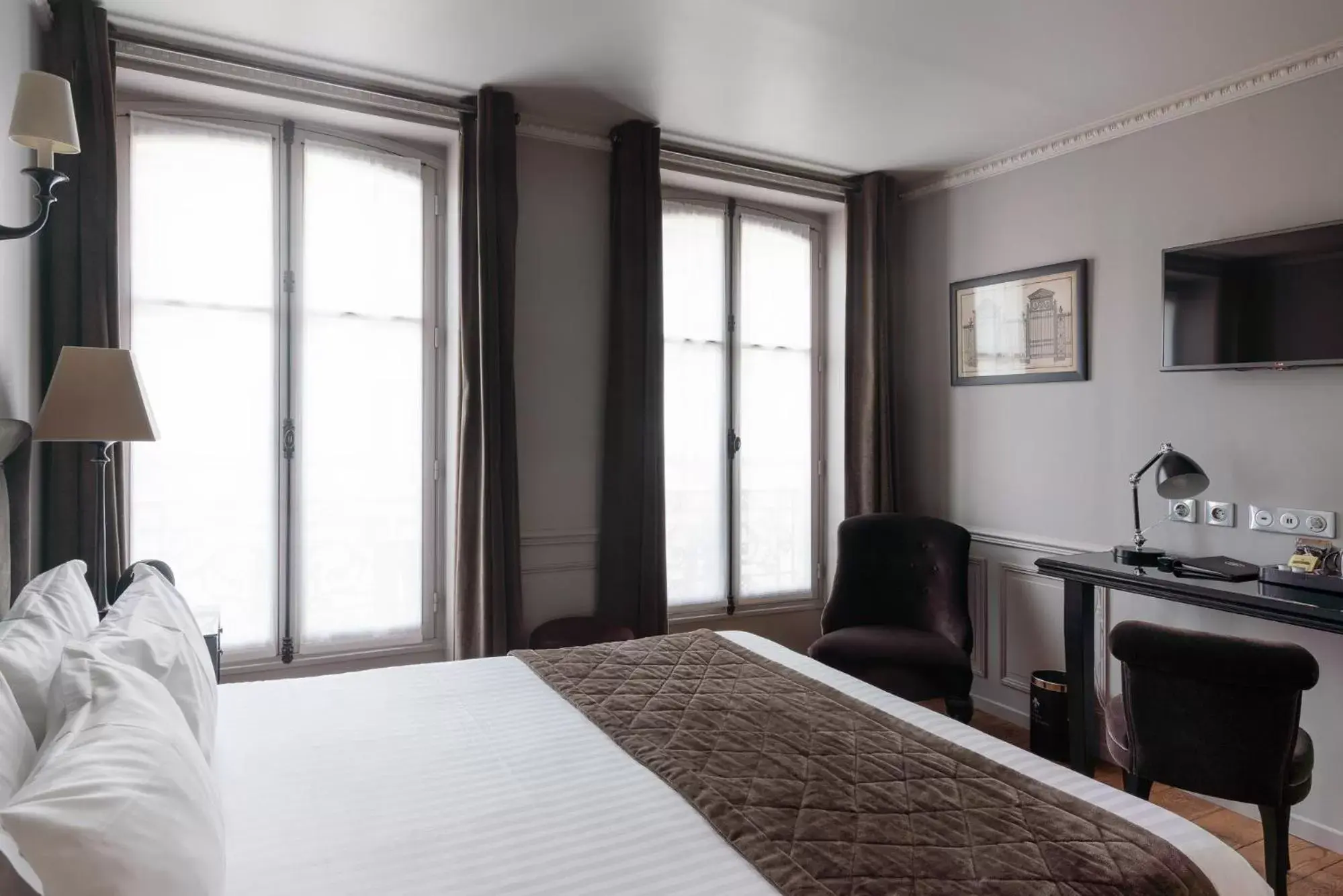 Bed in Hotel Saint-Louis Pigalle