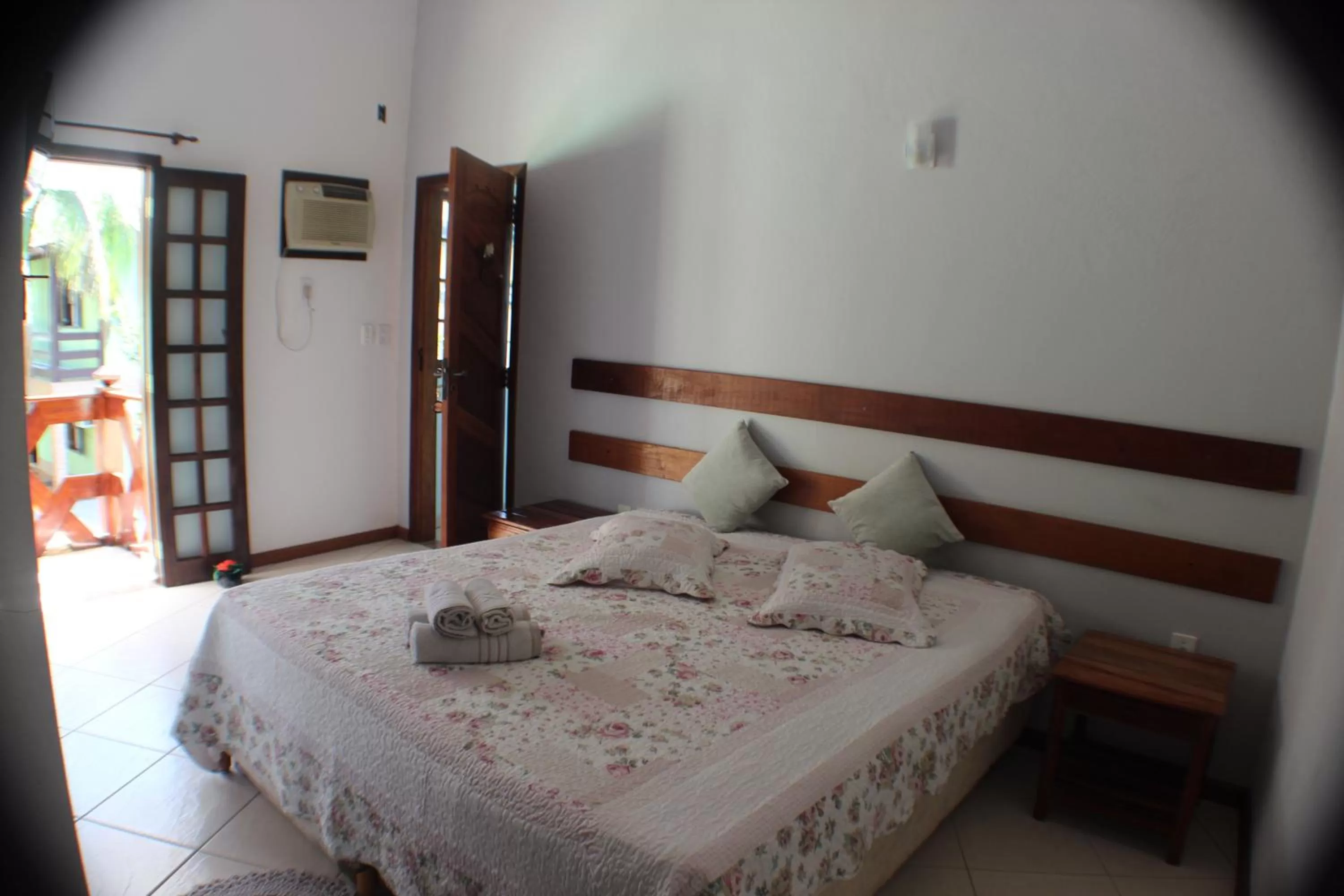 Bed in Pousada Flor de Paraty