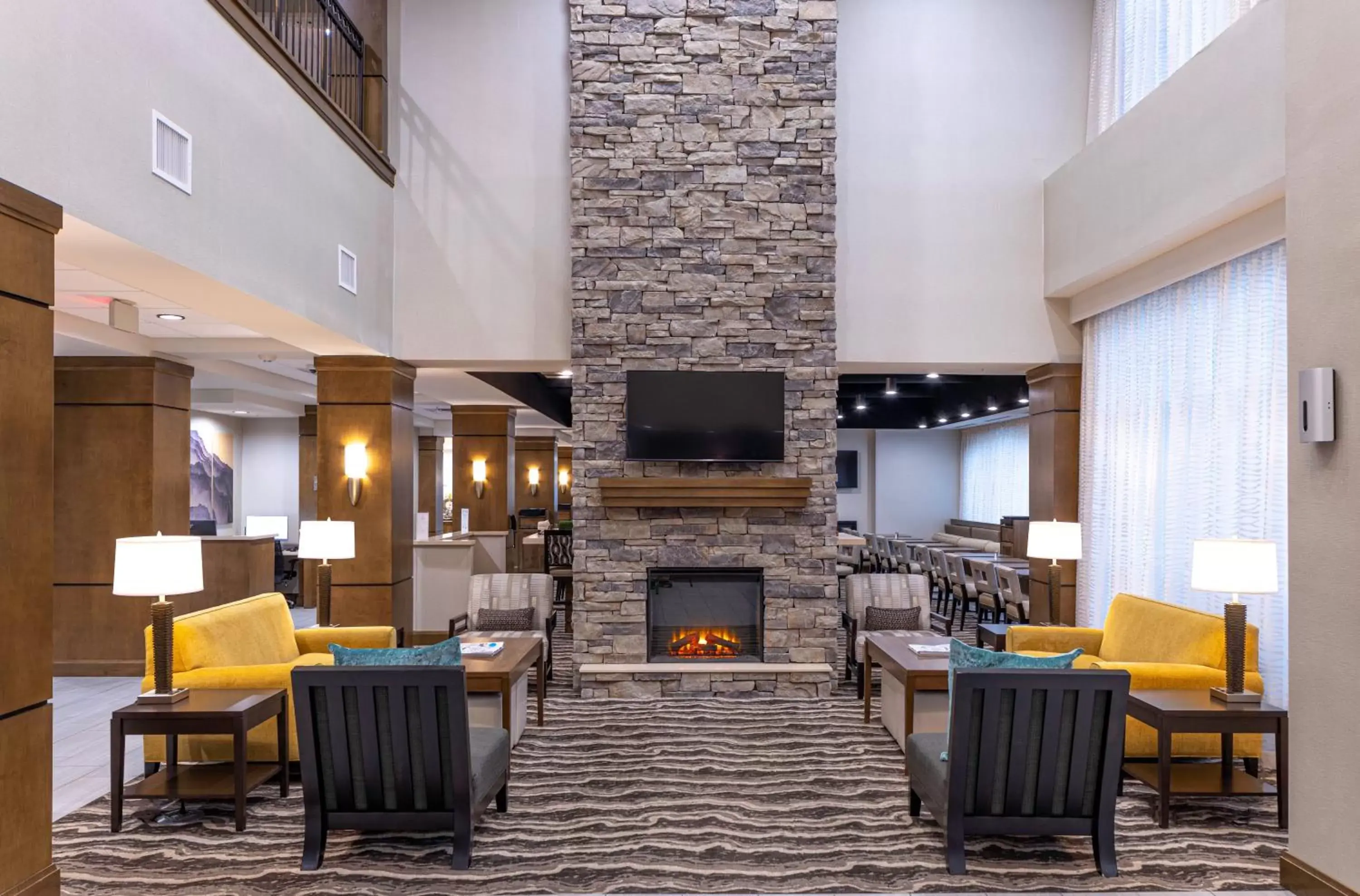 Lobby or reception, Restaurant/Places to Eat in Staybridge Suites Montgomery - Downtown, an IHG Hotel