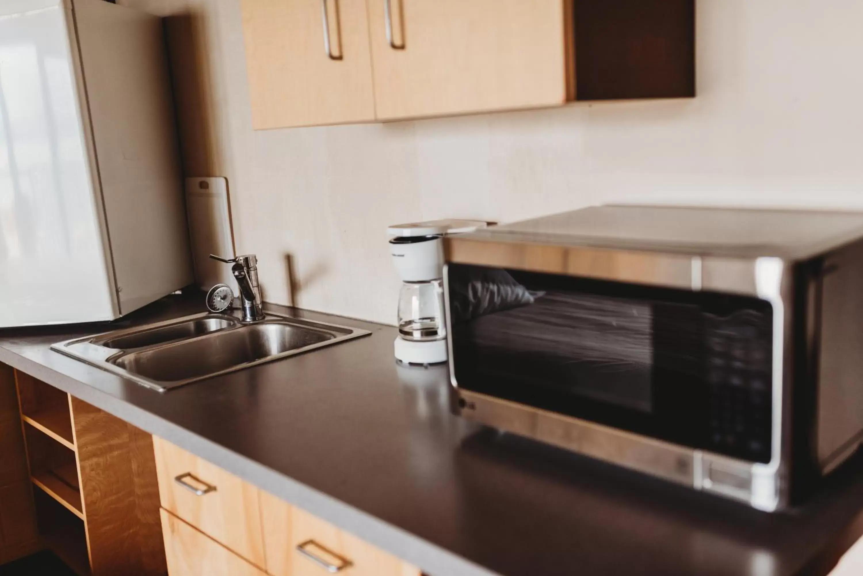 Kitchen/Kitchenette in The Oceanfront Hotel