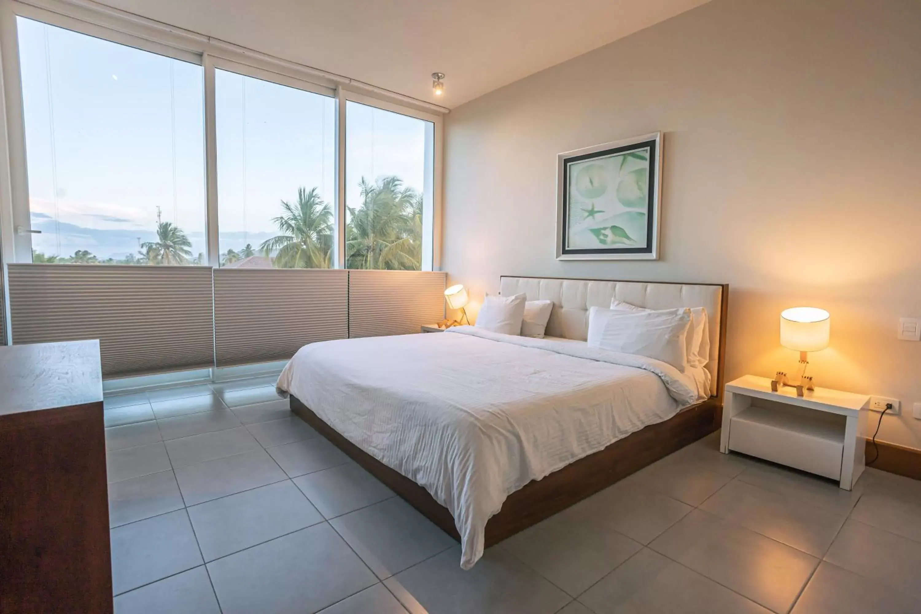 Bed in Ultravioleta Boutique Residences