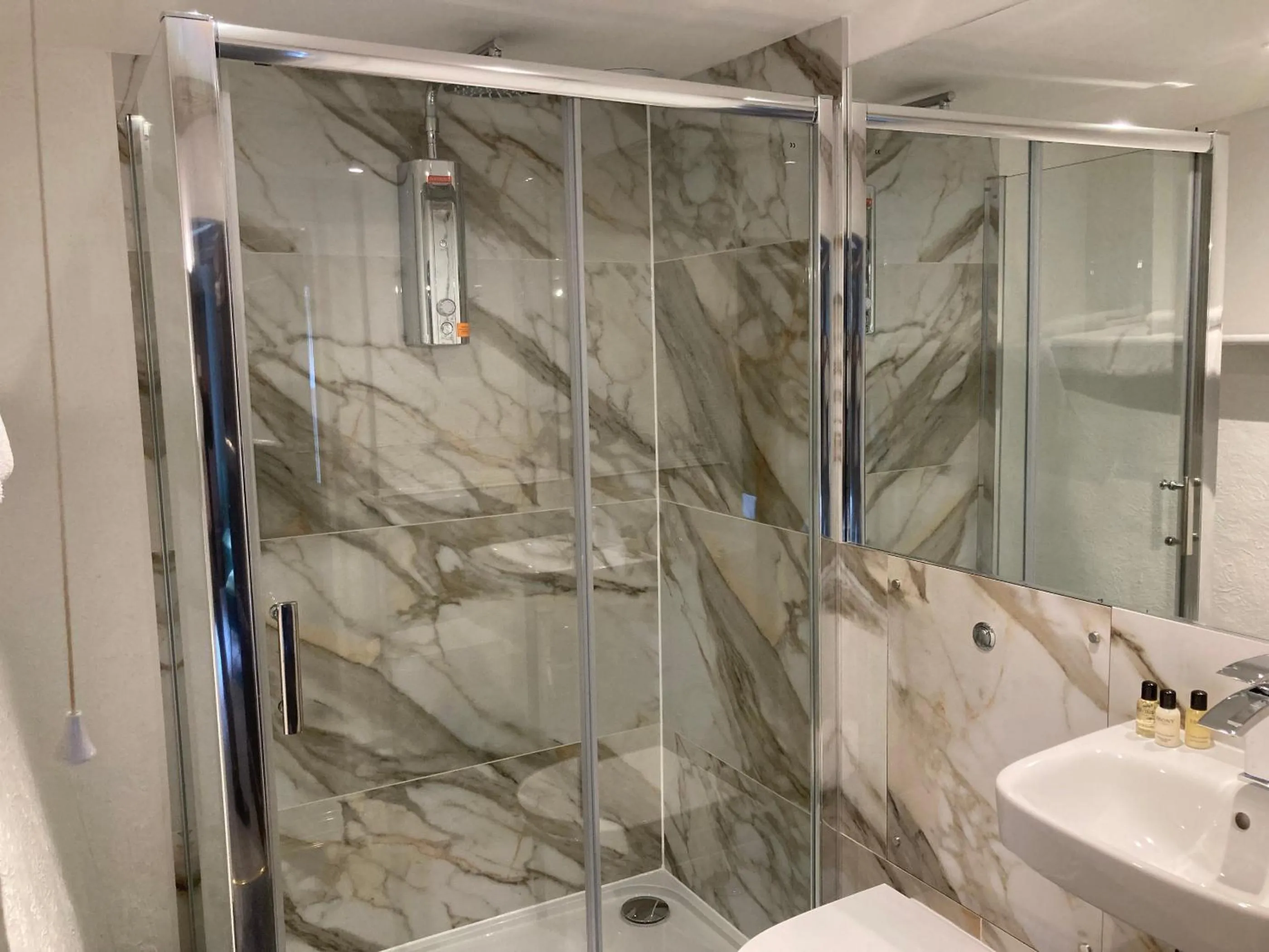 Shower in Tottington Manor Hotel