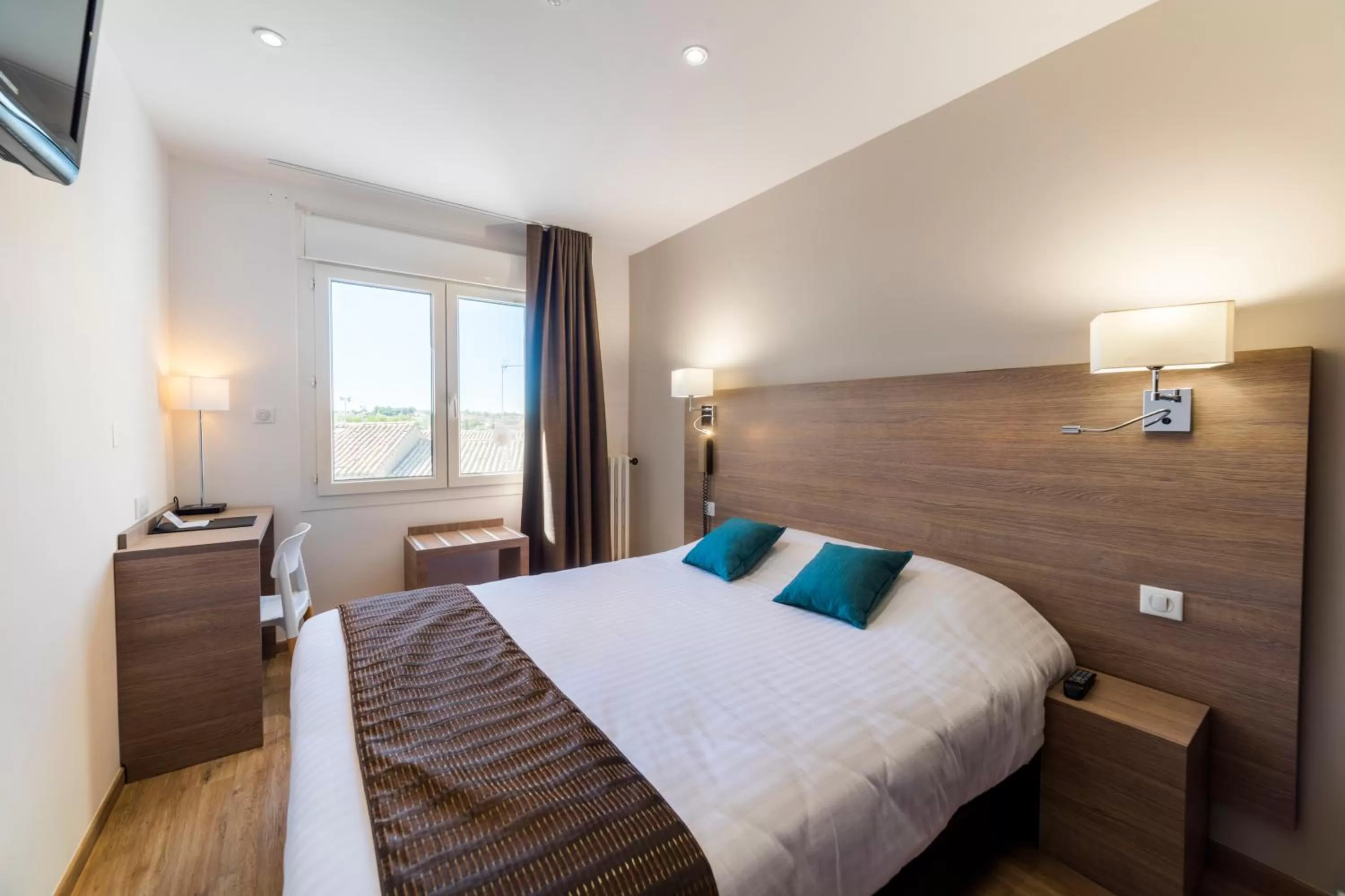 Bedroom, Bed in Logis Hôtel Restaurant Le Cours