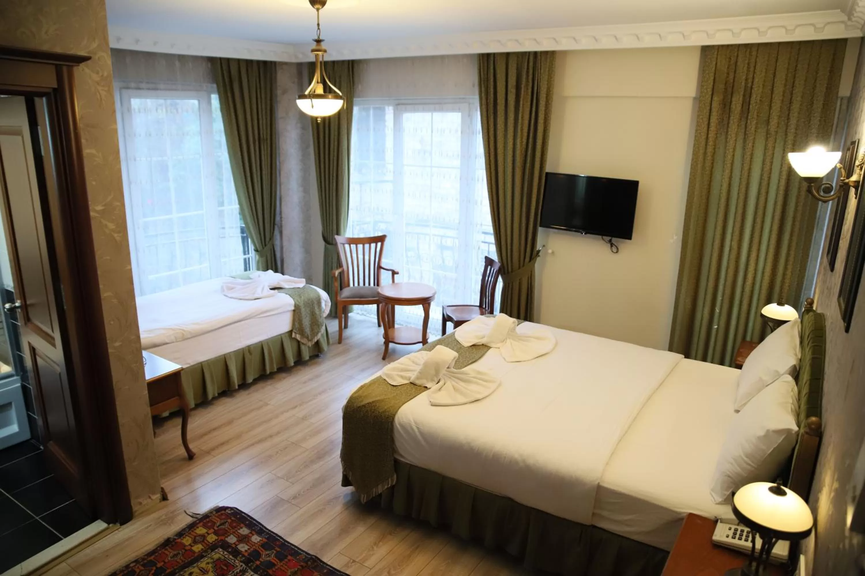 Bed in Basileus Hotel