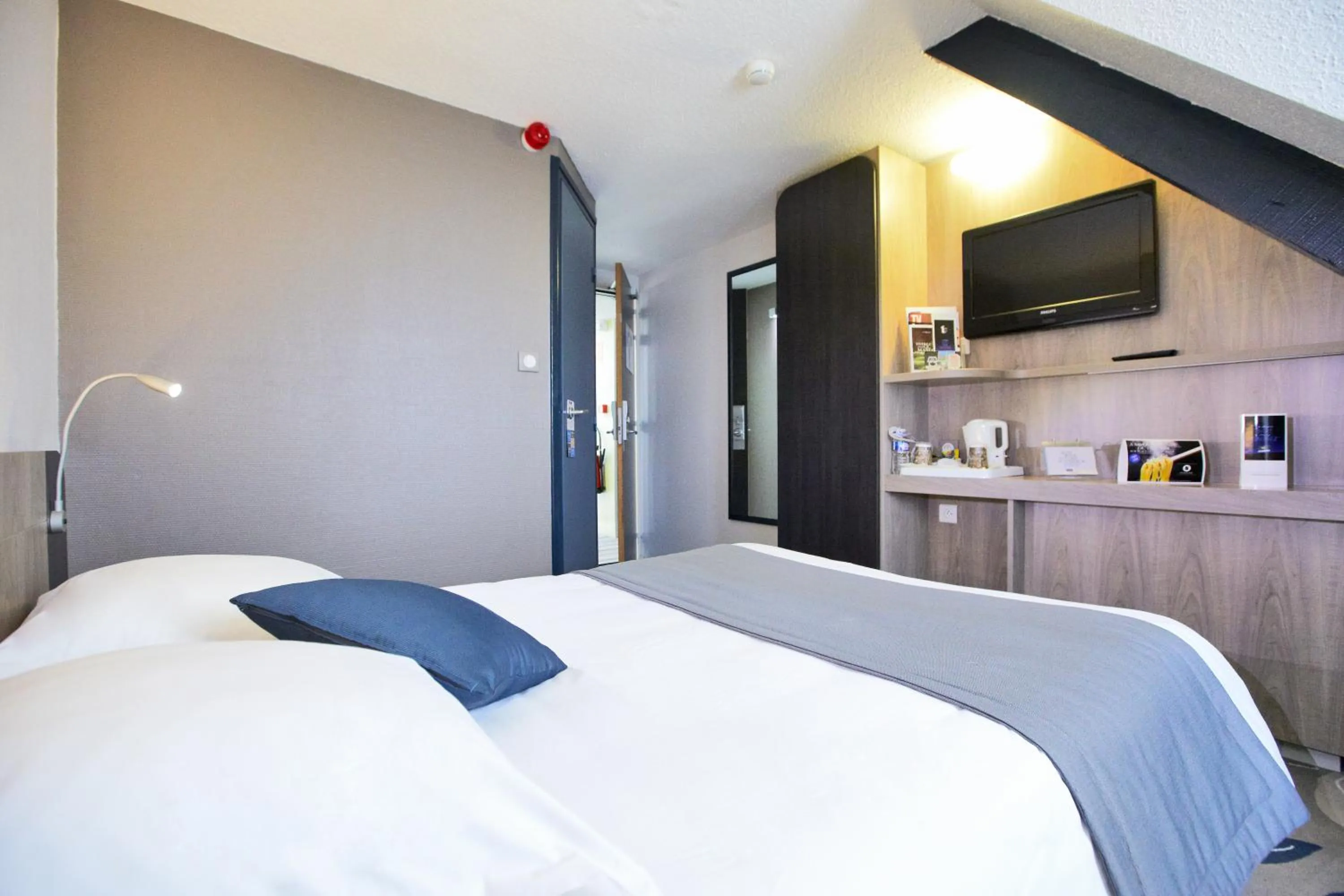 Photo of the whole room, Bed in Kyriad Hotel Nevers Centre