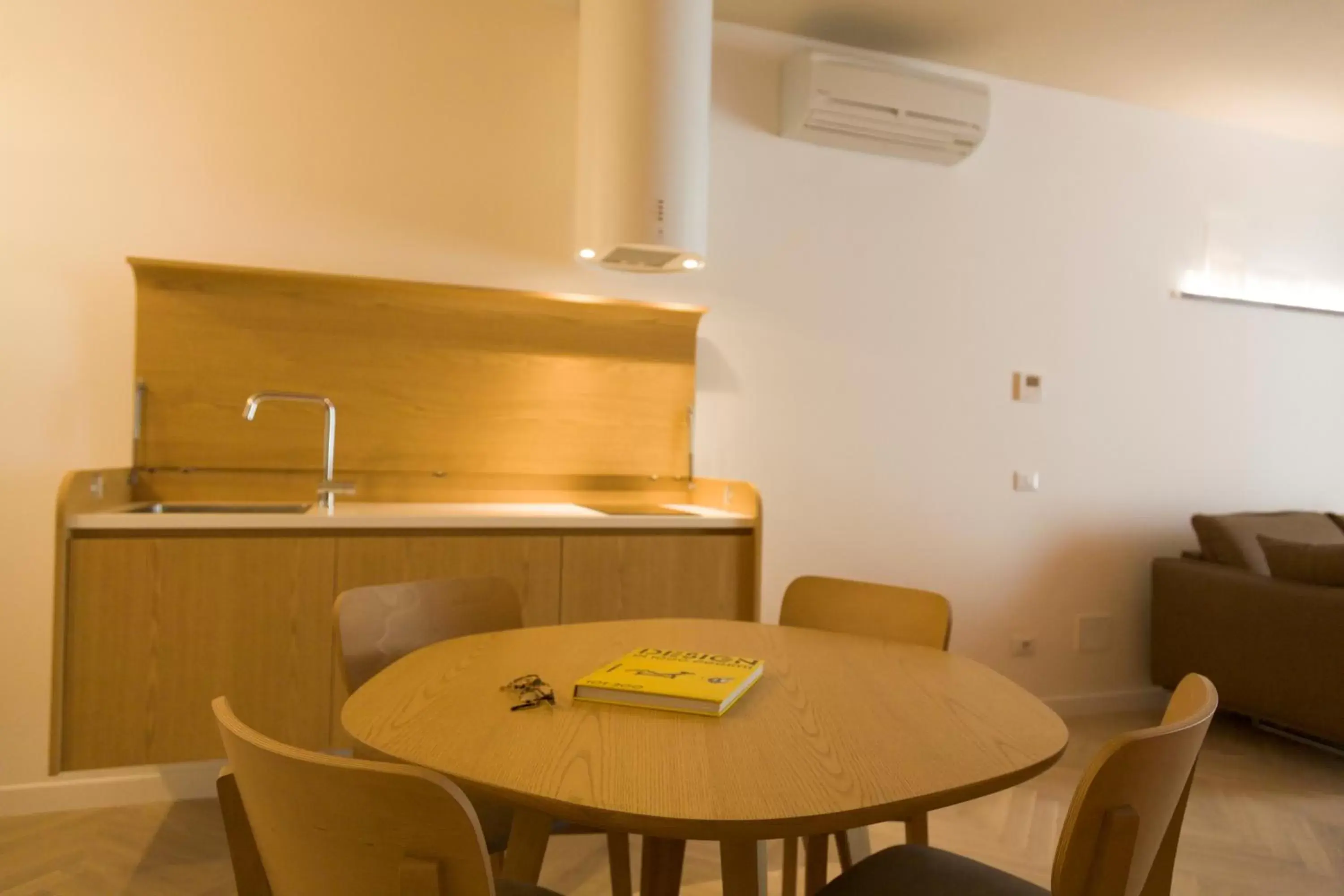 Kitchen or kitchenette, Dining Area in Metropolitan Suites