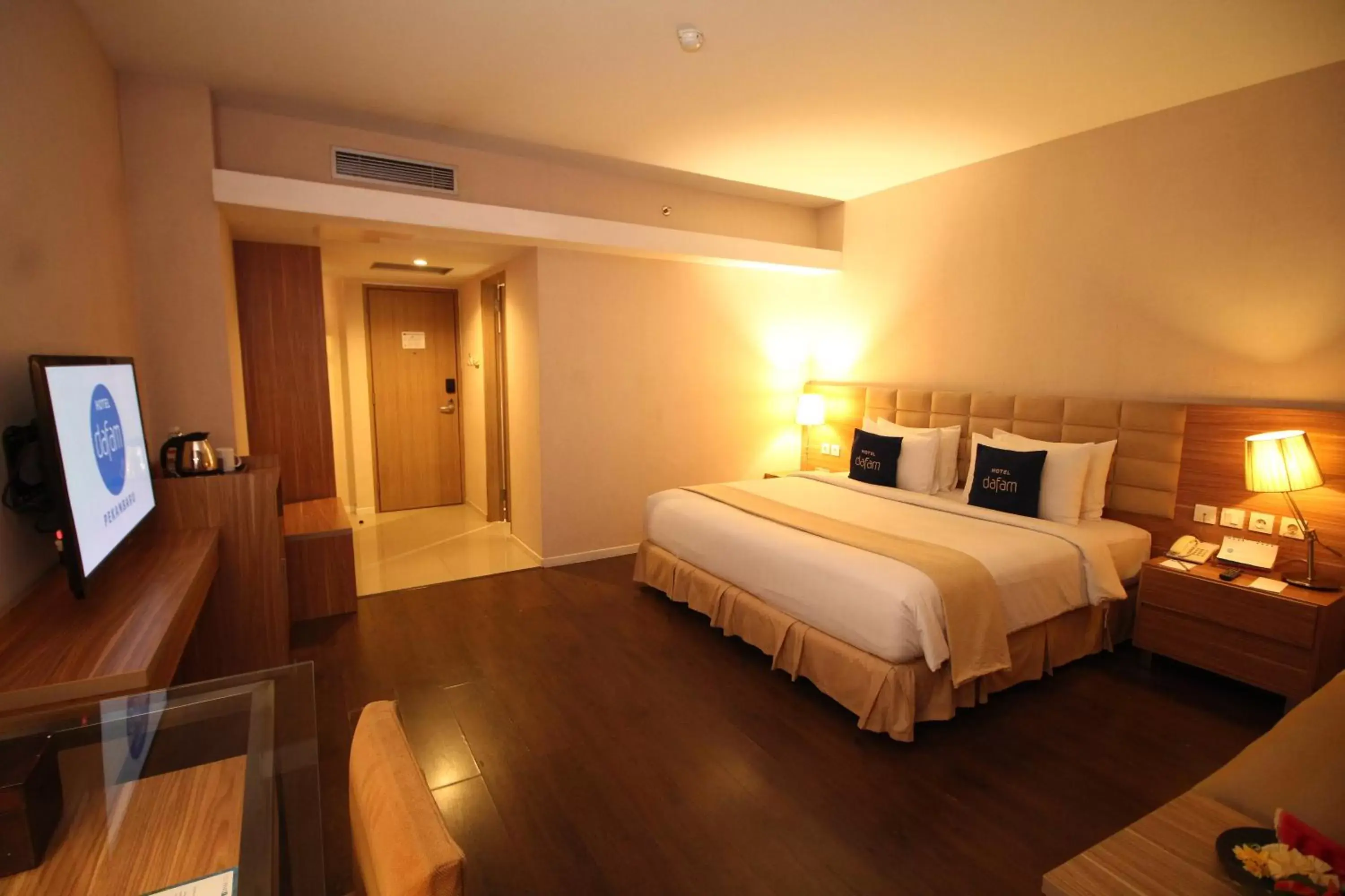 Bed in Hotel Dafam Pekanbaru