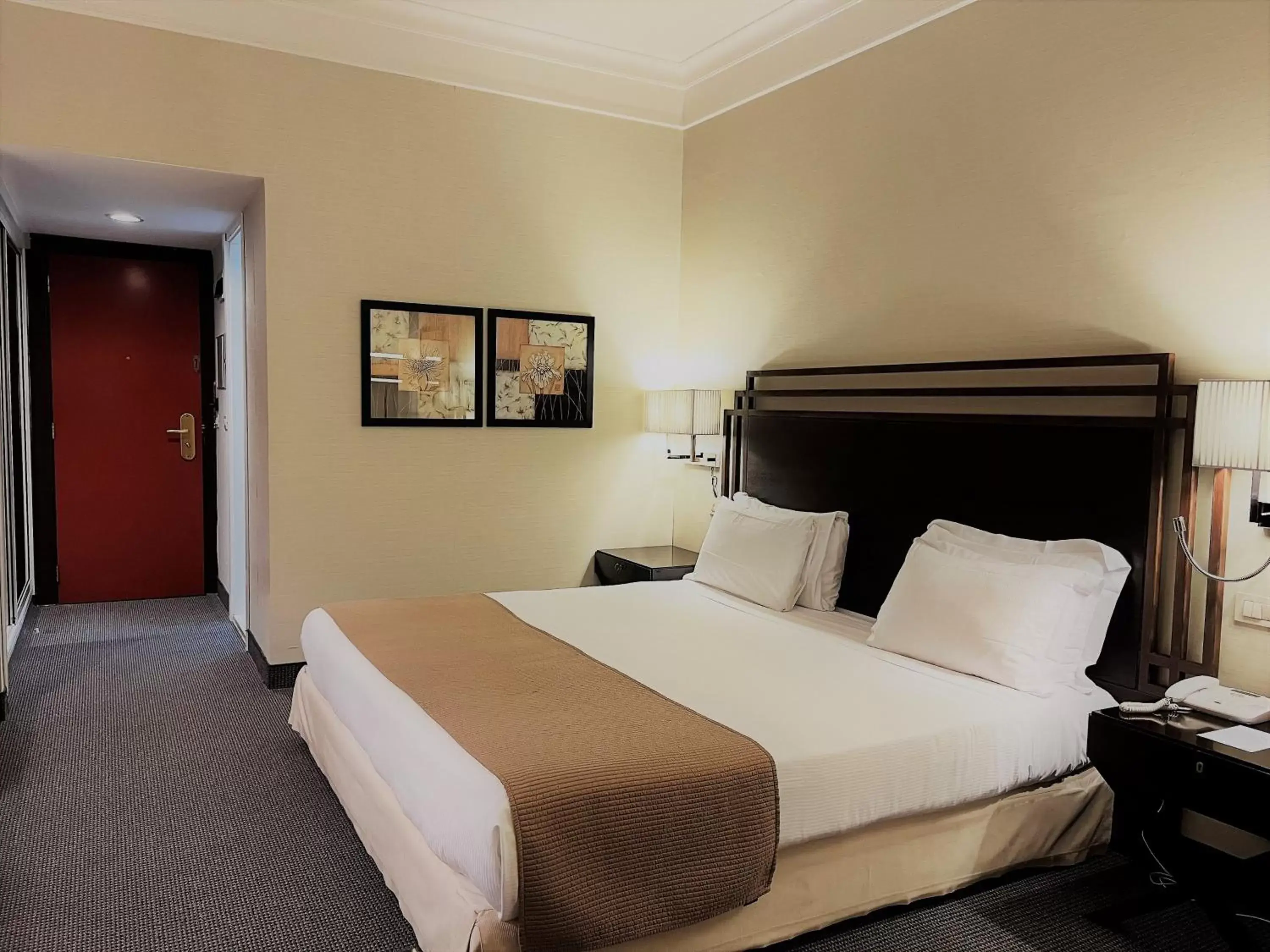 Photo of the whole room, Bed in Crowne Plaza Rome St. Peter's, an IHG Hotel