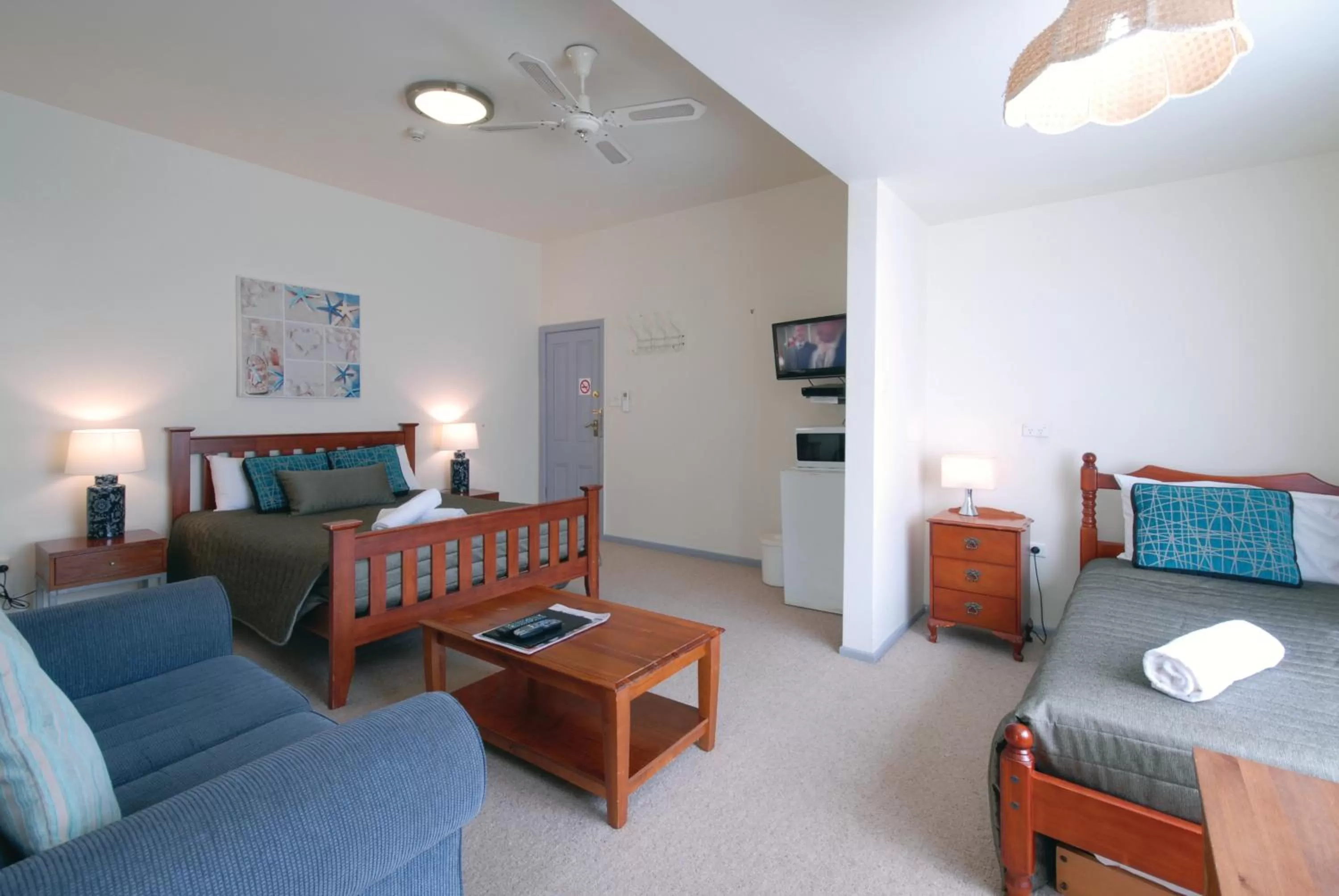 Bed in Riverview Boutique Motel