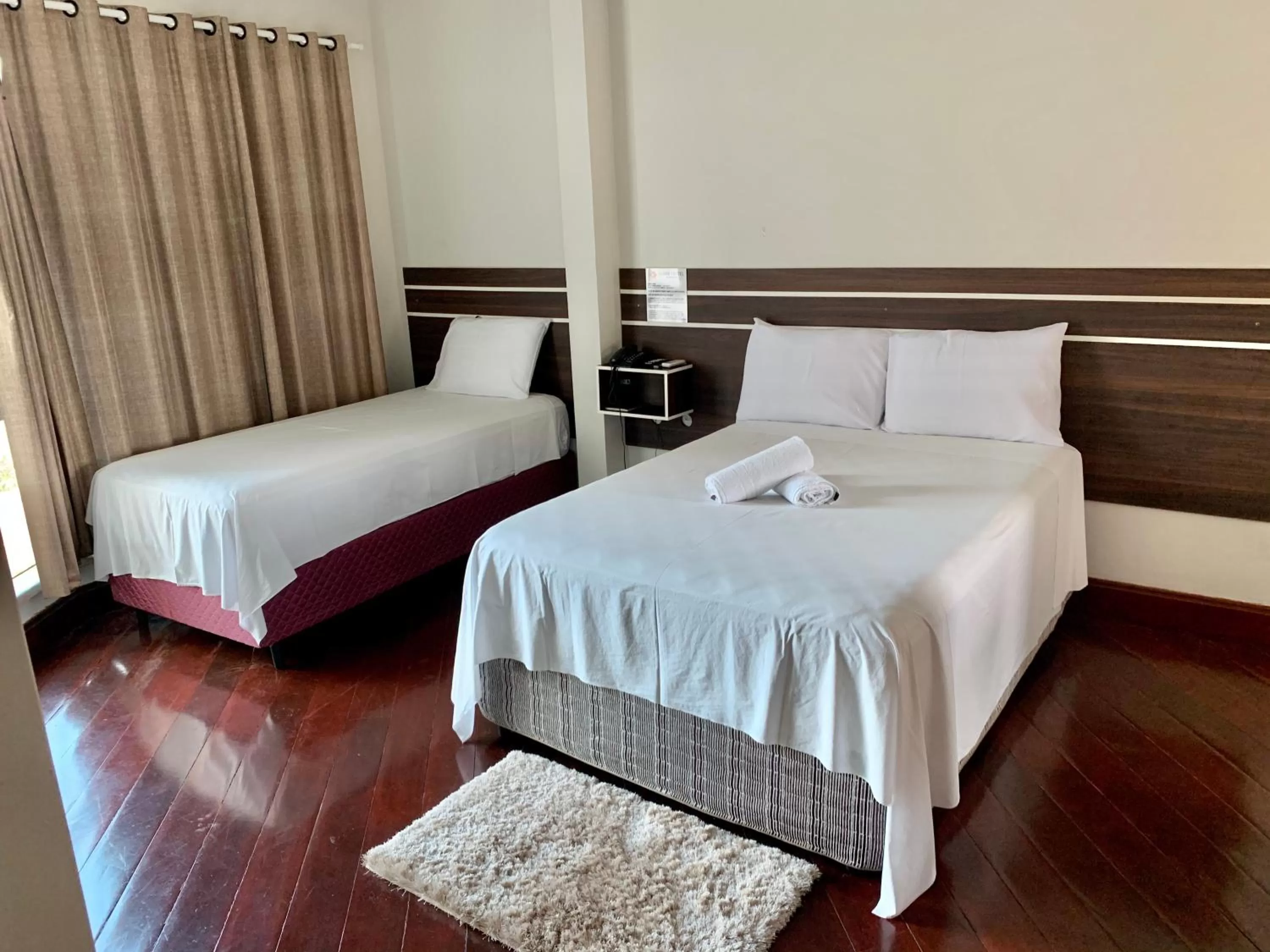 Bed in SAMIR HOTEL COMFORT