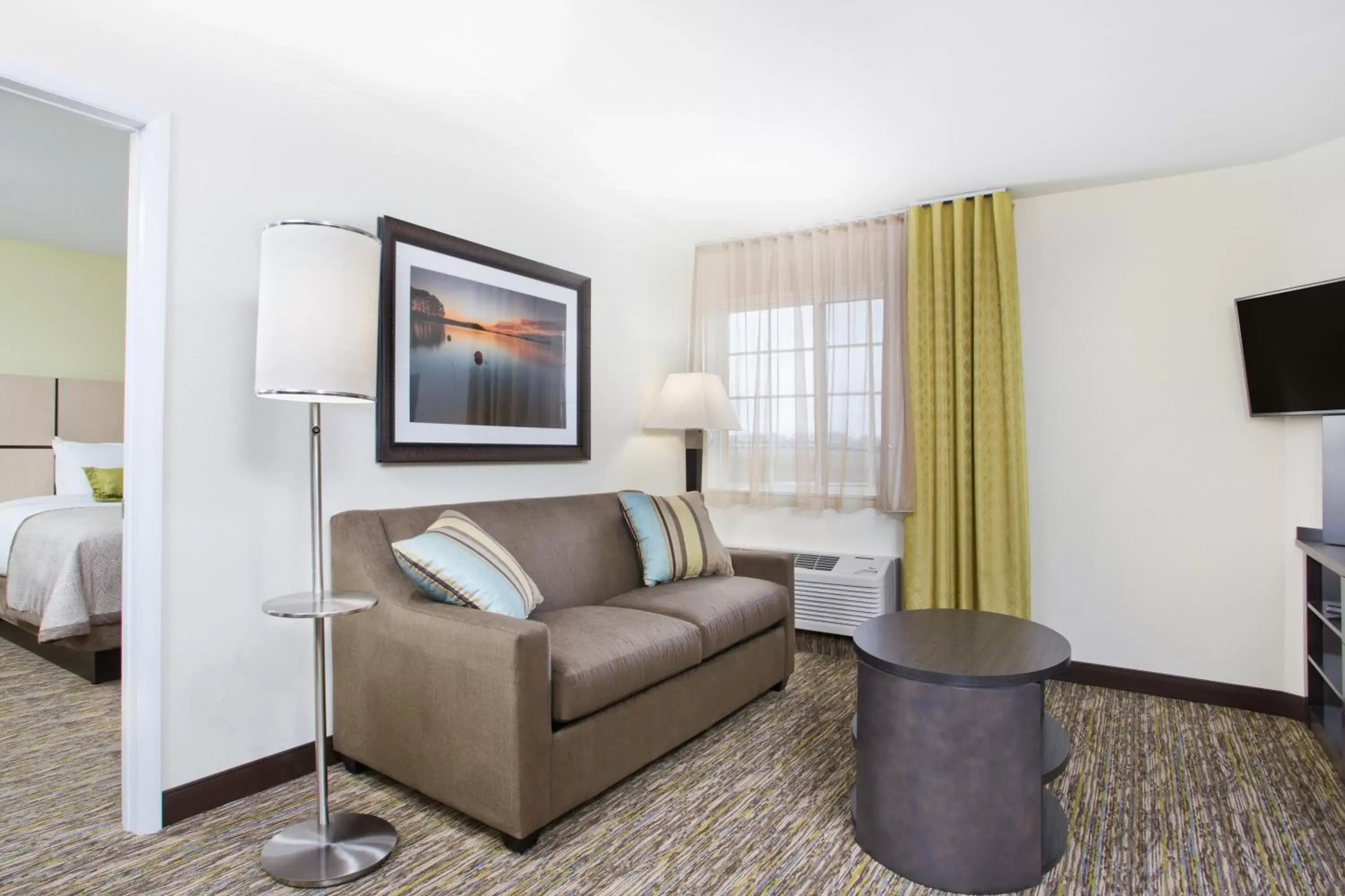 Bedroom, Seating Area in Candlewood Suites Fort Campbell - Oak Grove, an IHG Hotel