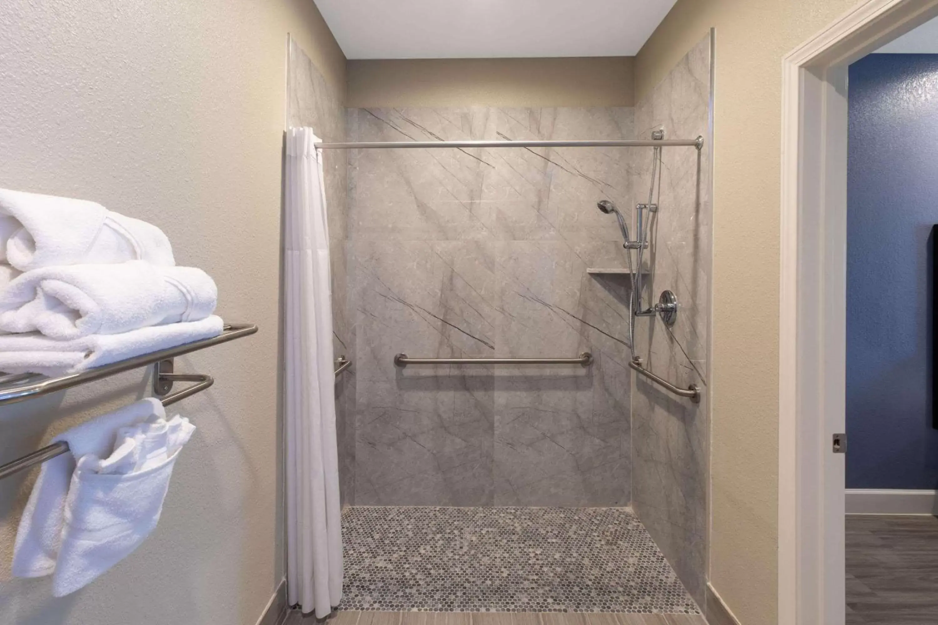Shower, Bathroom in Days Inn & Suites by Wyndham La Porte