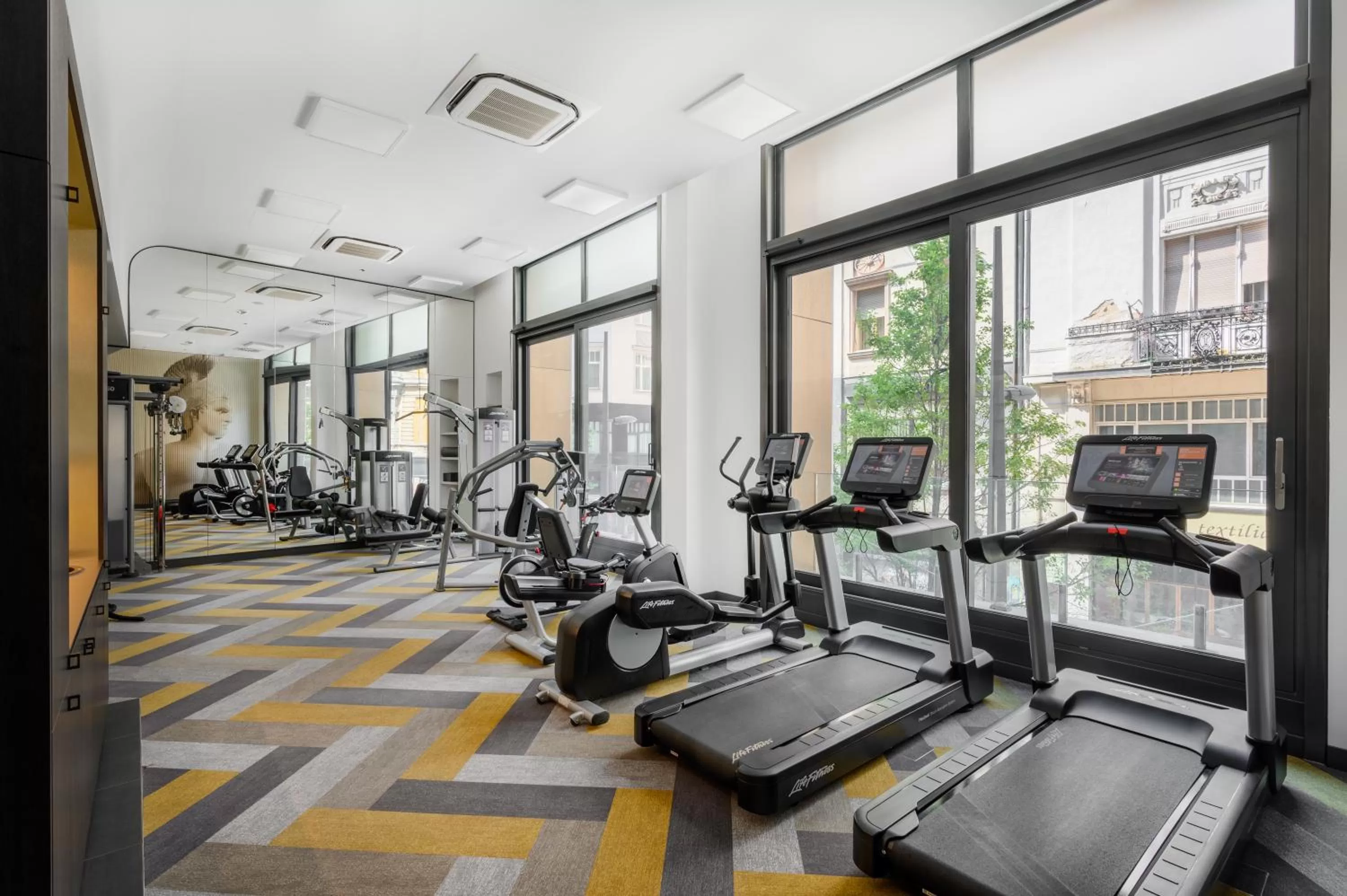 Fitness centre/facilities in Emerald Hotel by Continental Group