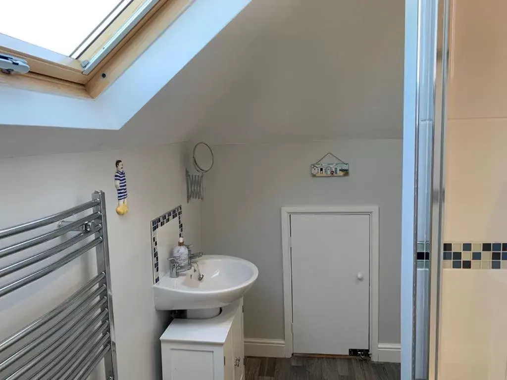 Bathroom in TRETHEWEY GUEST HOUSE