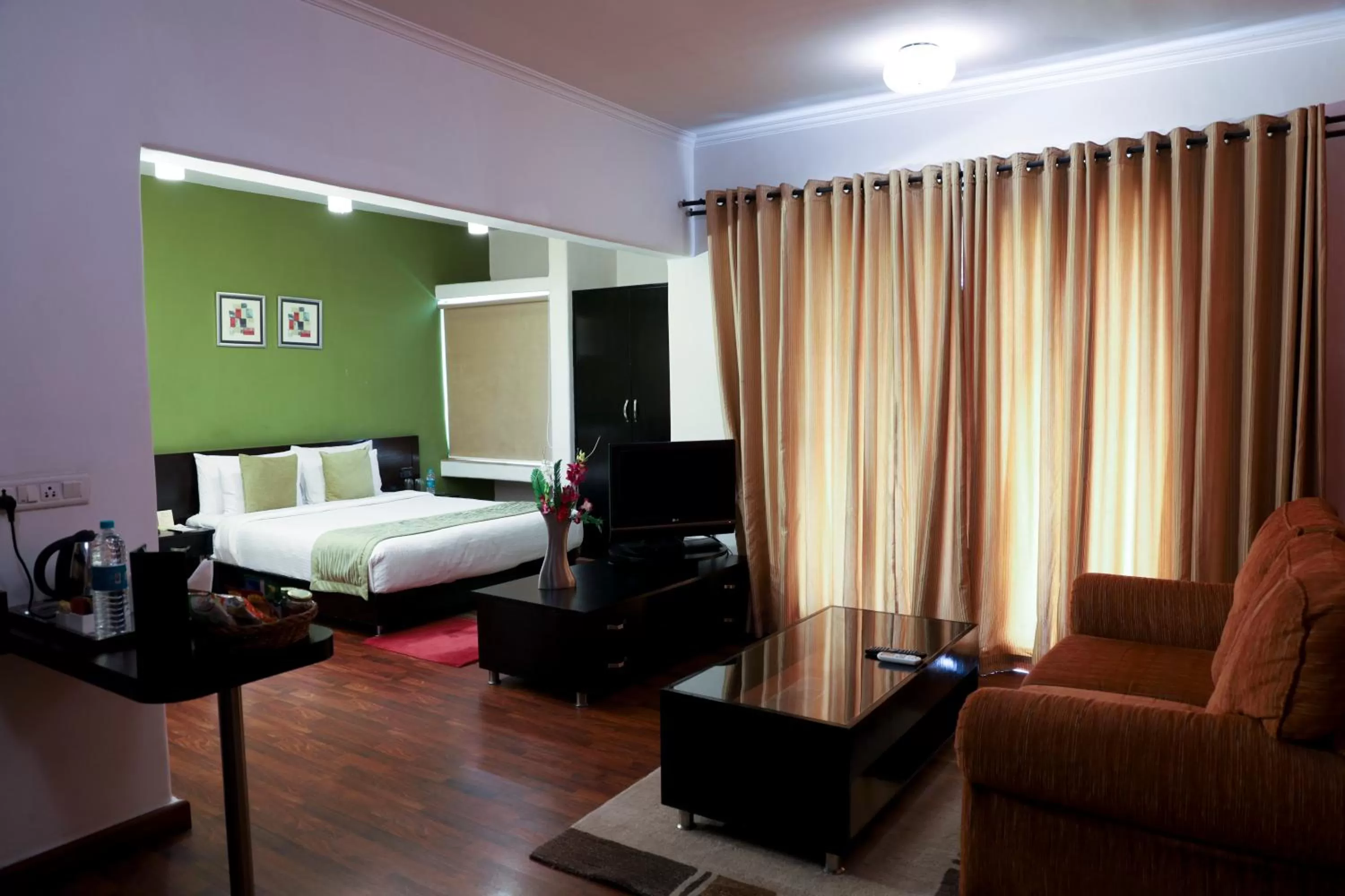 Photo of the whole room, Bed in Royal Orchid Golden Suites Pune