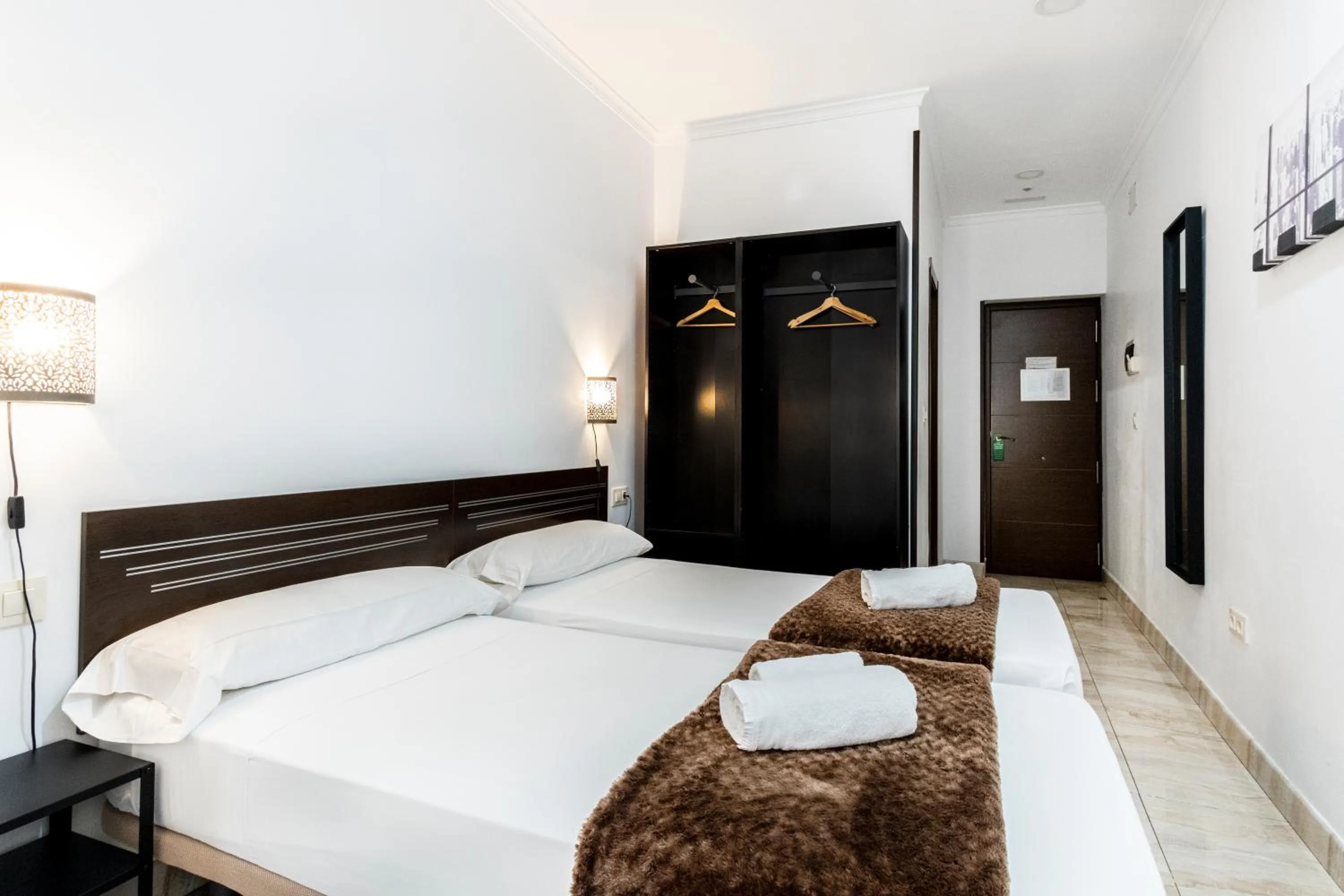 Photo of the whole room, Bed in Hostal Rincón de Sol - Centro Madrid - Self Checkin