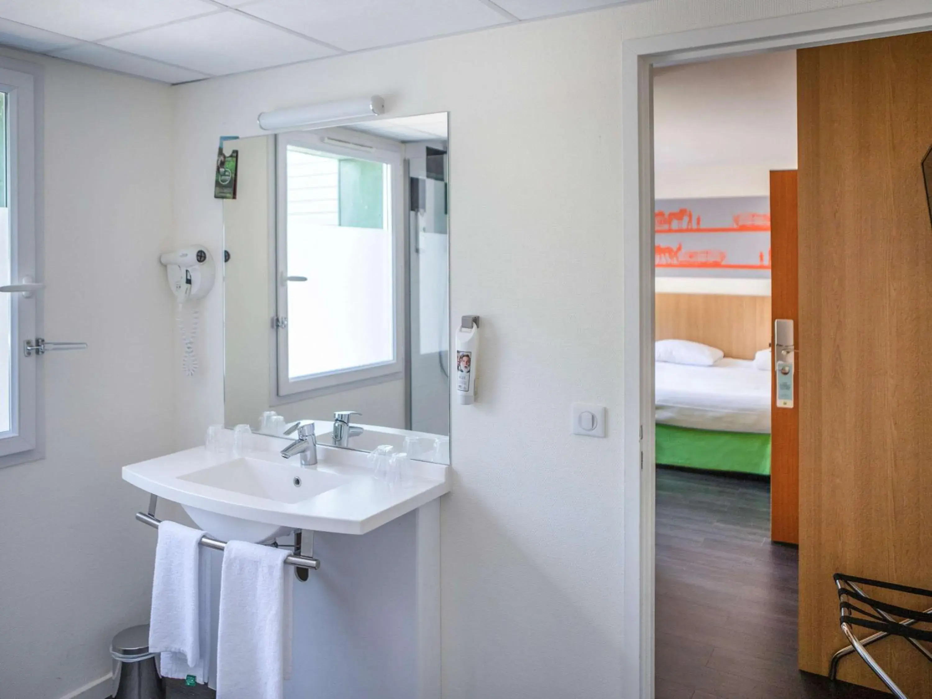 Photo of the whole room, Bathroom in ibis Styles Bourbon Lancy