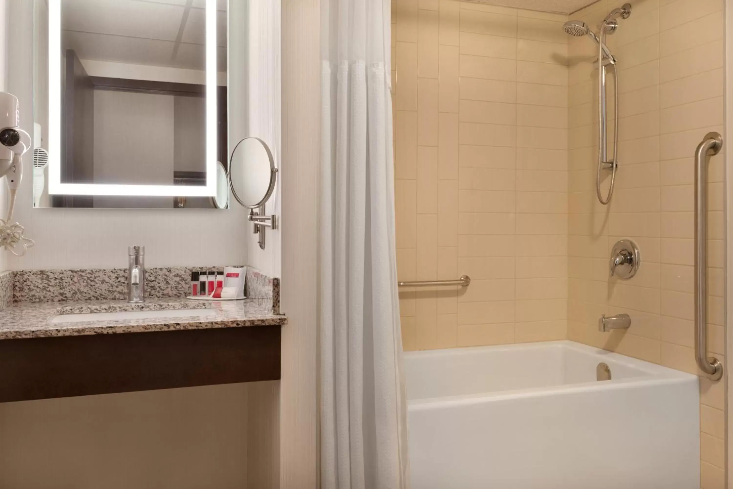 Bathroom in Ramada Plaza by Wyndham Regina Downtown