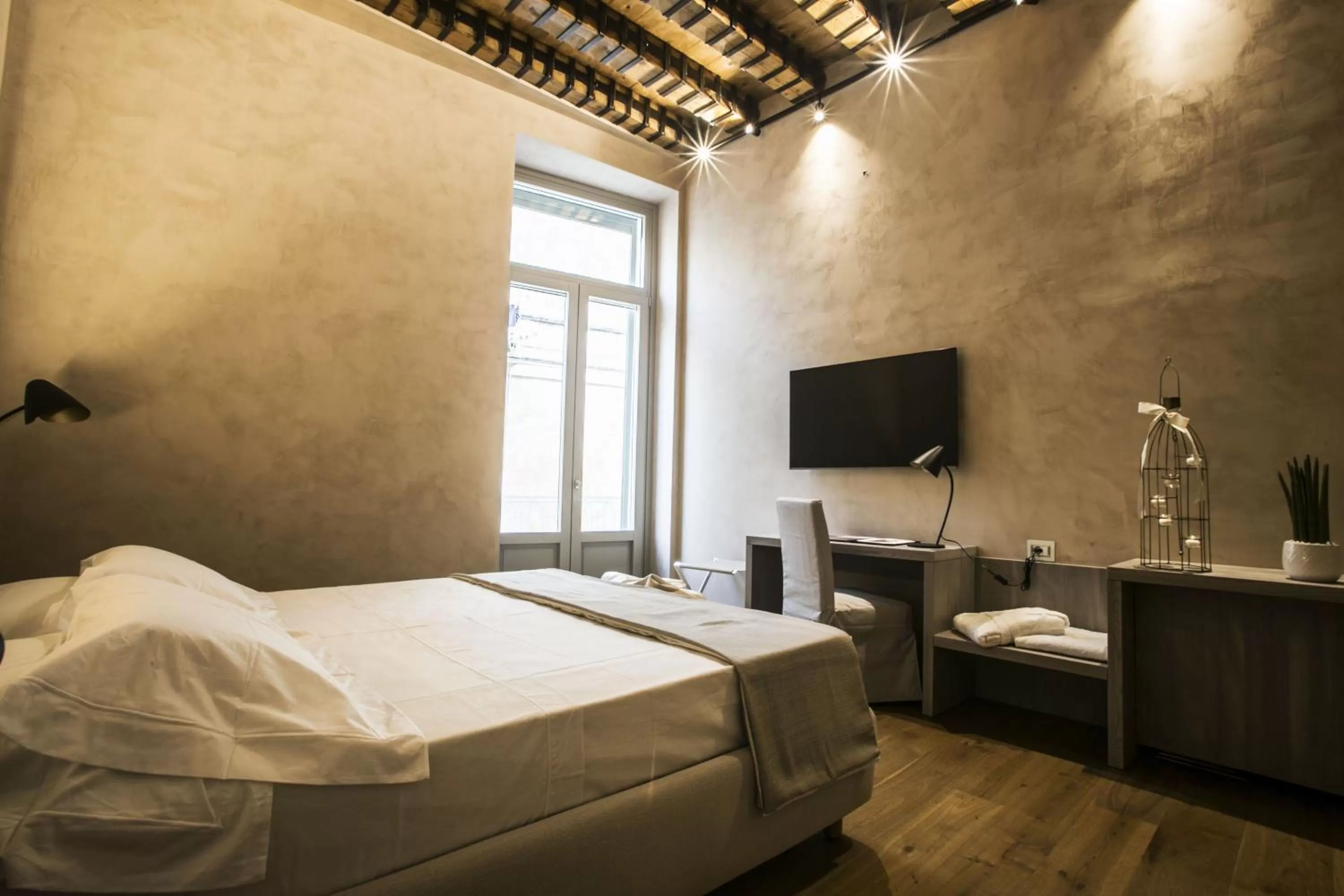 Bed in Edward Rooms & Wellness B&B