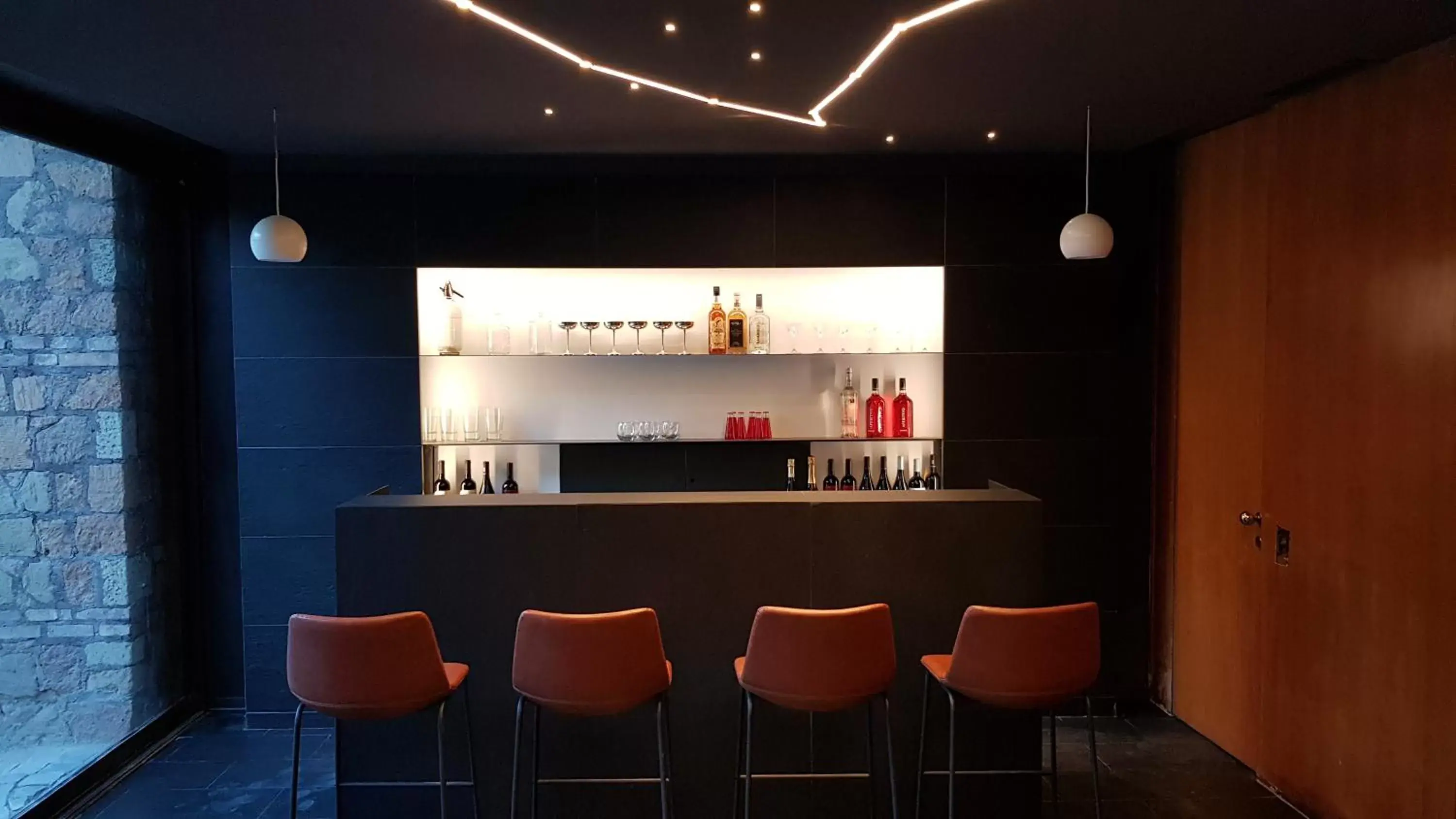 Lounge or bar, Kitchen/Kitchenette in Fauno Urban Resort