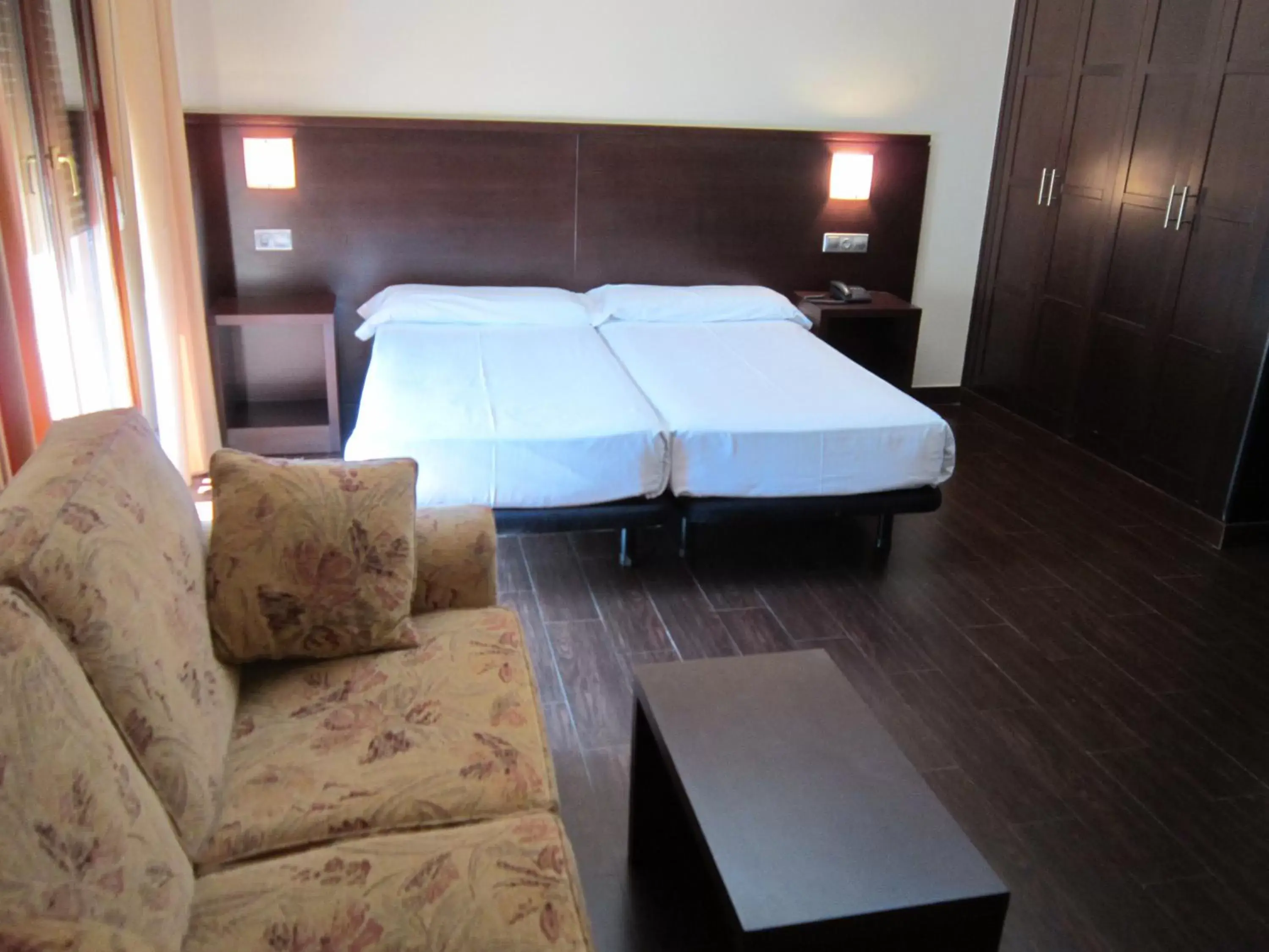 Living room, Bed in Euba Hotel