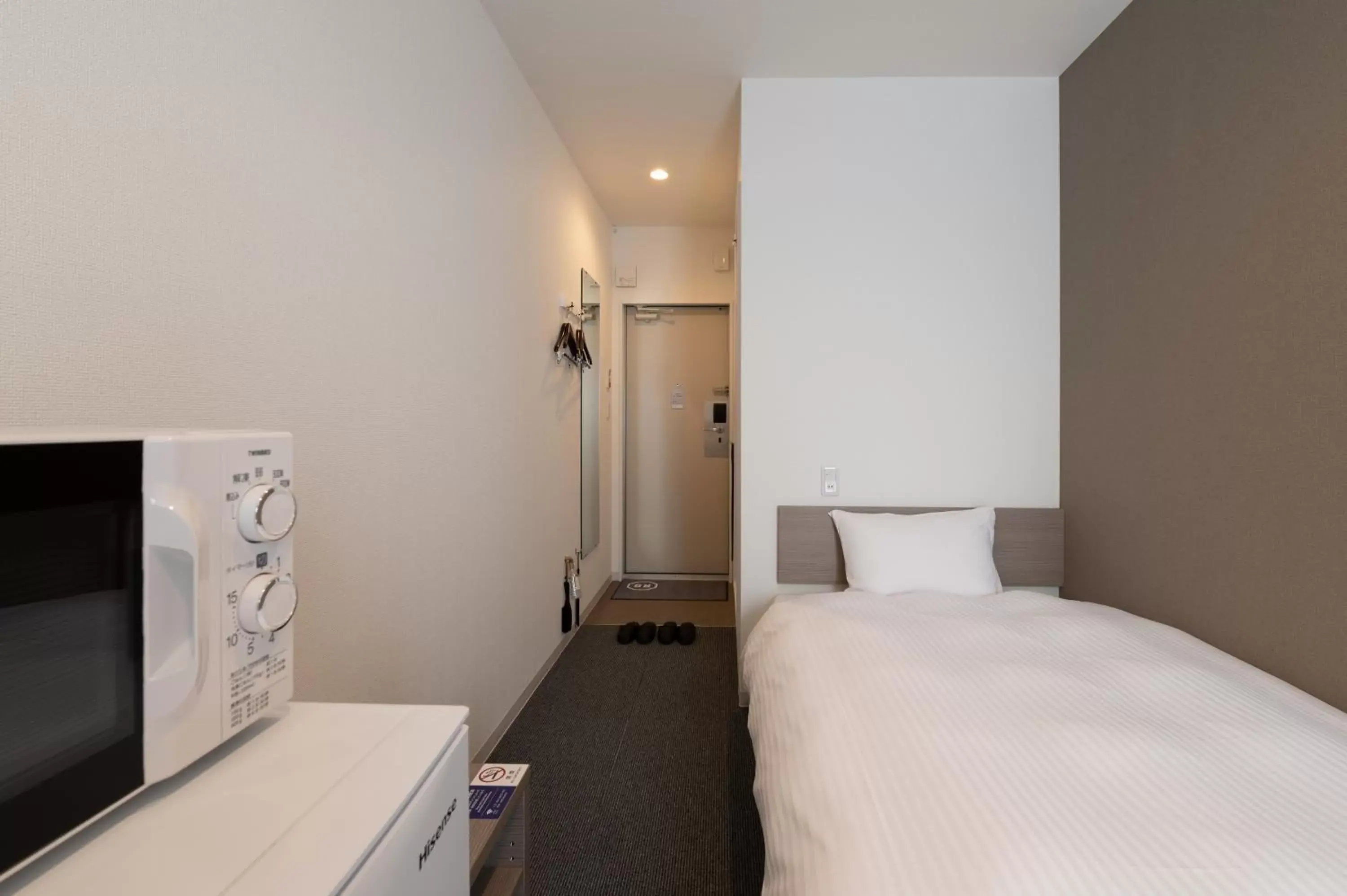 Bed in HOTEL R9 The Yard Taketoyo Bed in HOTEL R9 The Yard Taketoyo