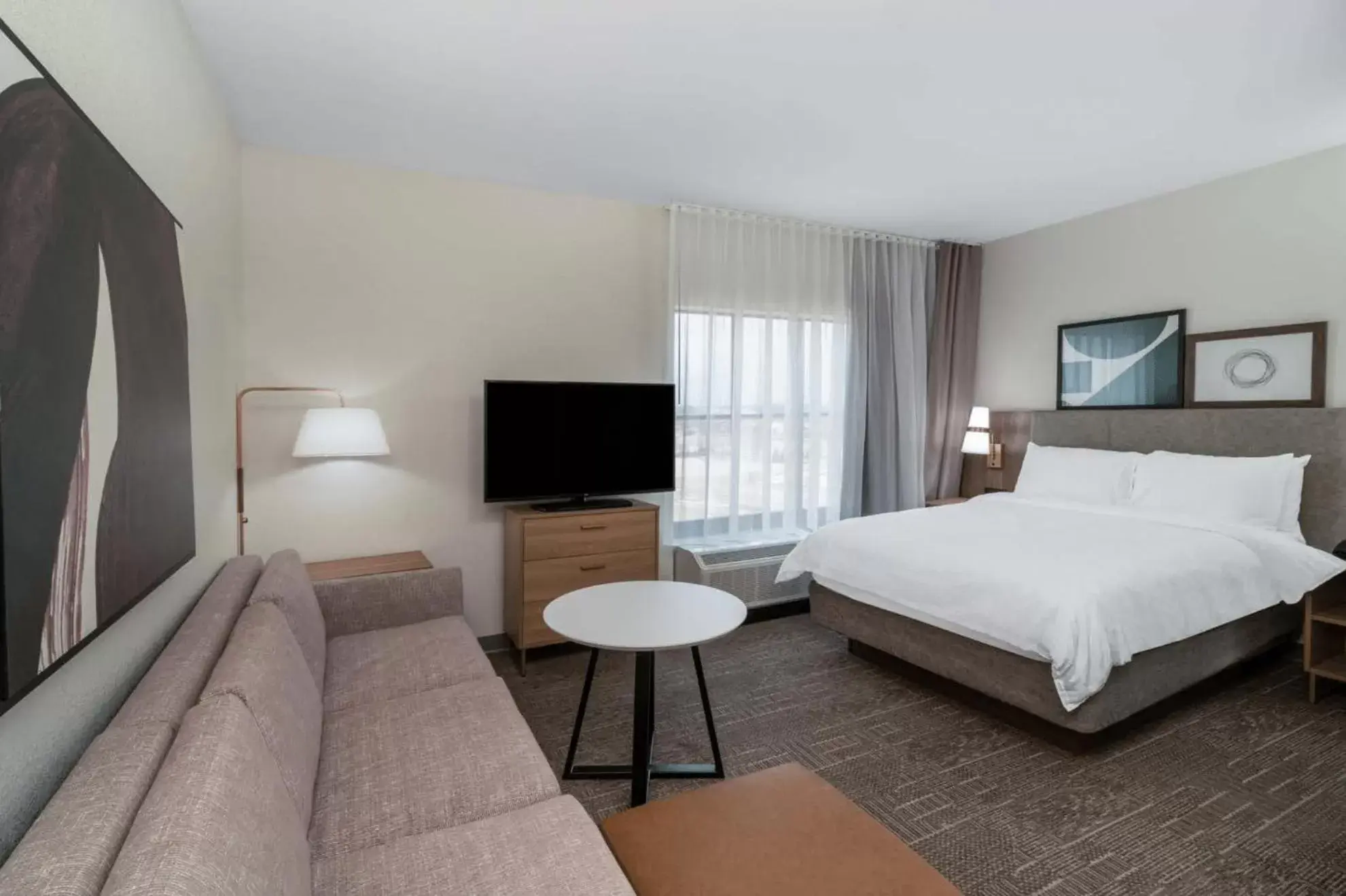 Bedroom, TV/Entertainment Center in Staybridge Suites - Flowood - NW Jackson, an IHG Hotel
