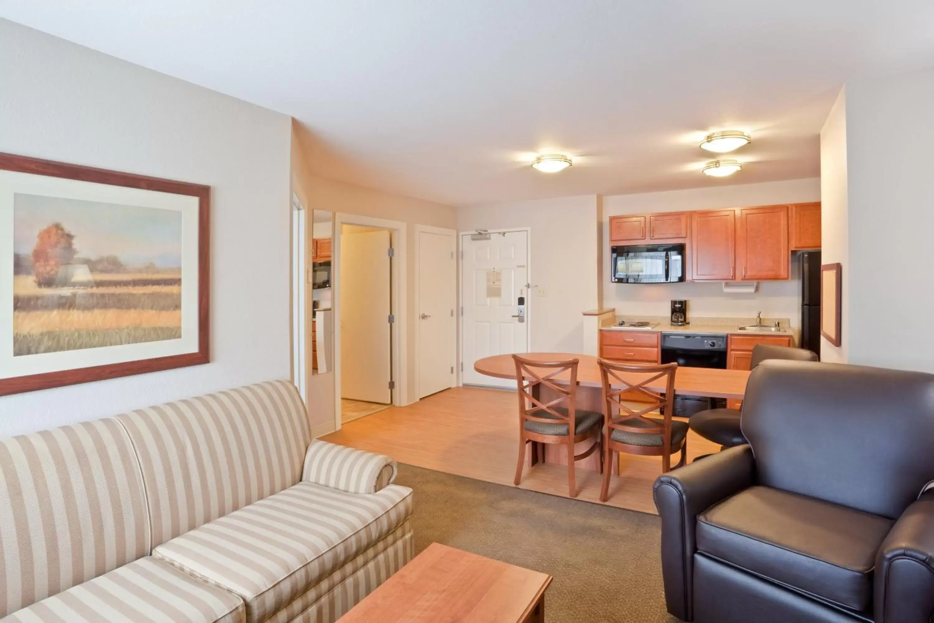 Bedroom, Seating Area in Candlewood Suites Oak Harbor, an IHG Hotel