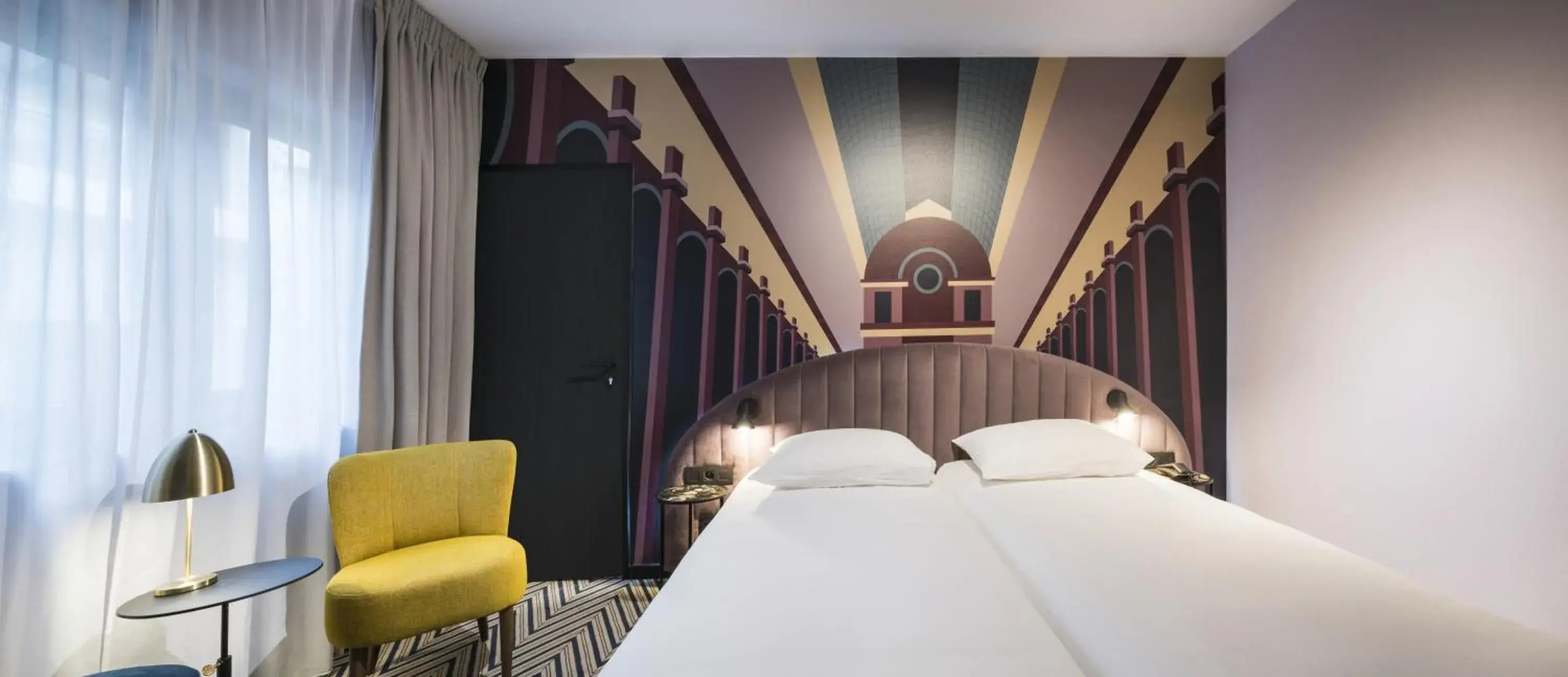 Bedroom in Hotel Hubert Grand Place