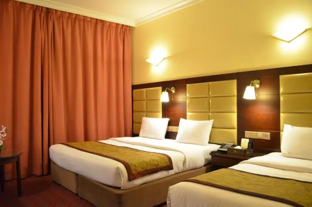 Photo of the whole room, Bed in Orchid Hotel