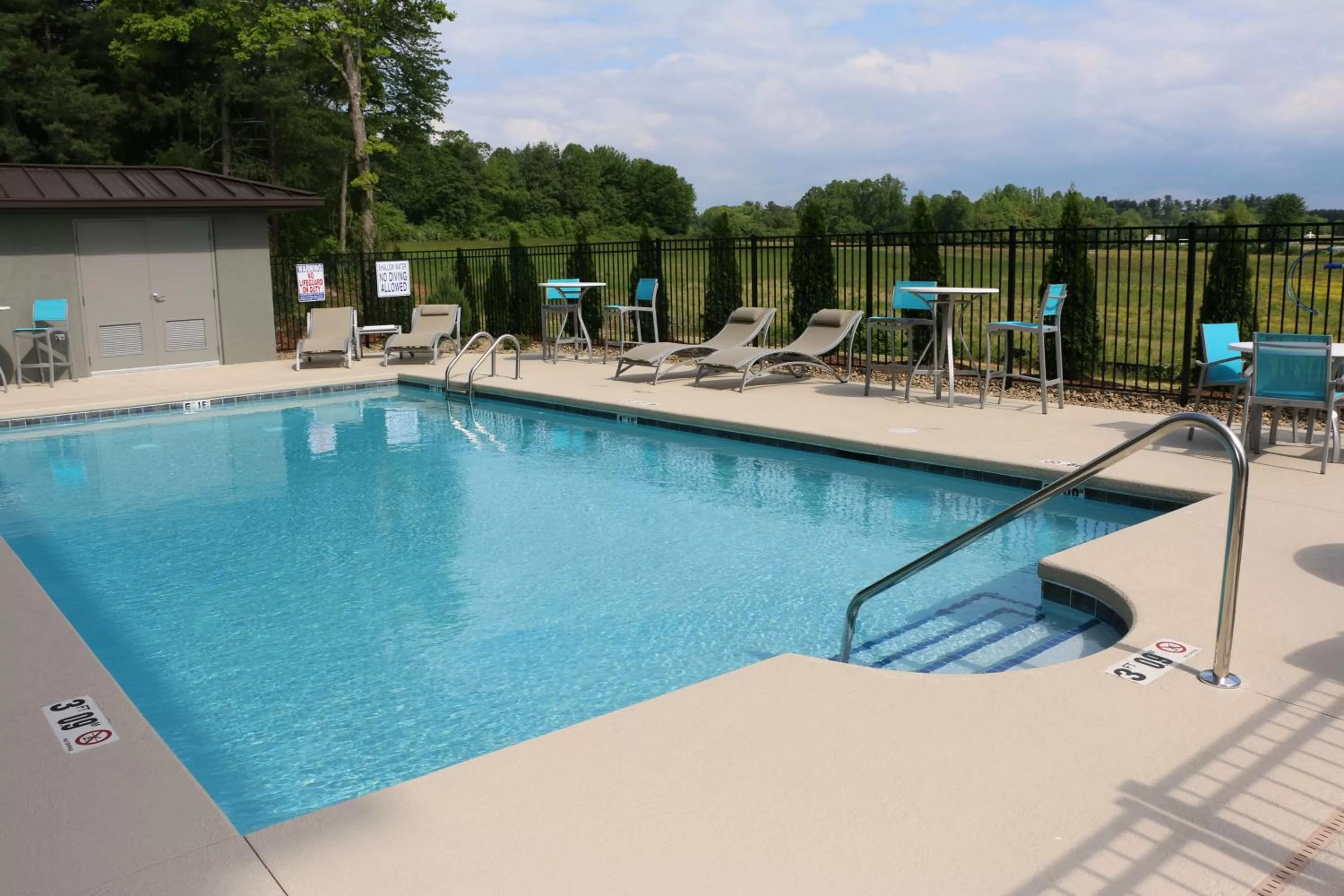 Swimming pool in Holiday Inn Express & Suites - Hendersonville SE - Flat Rock by IHG
