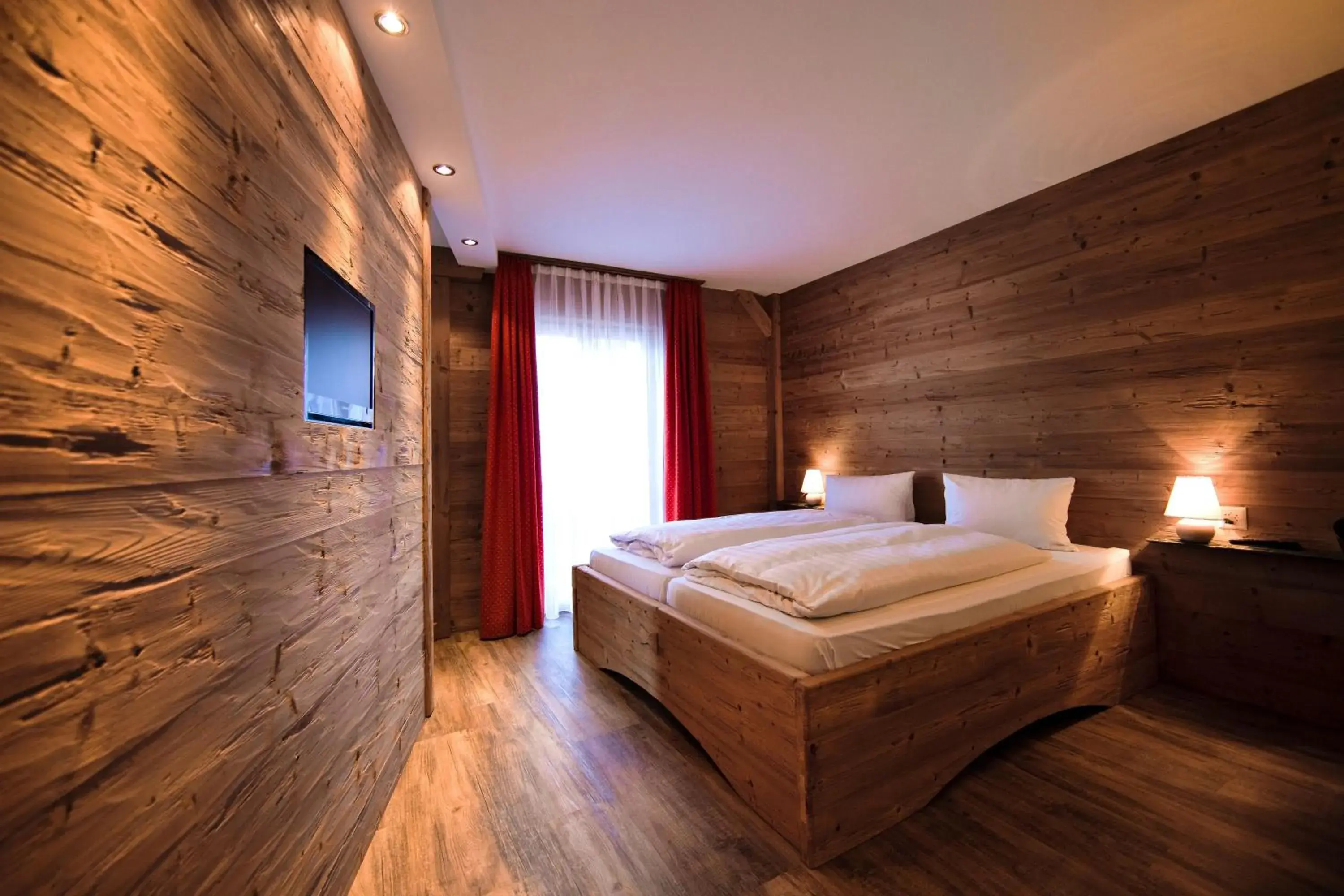 Bed in Arosa Vetter Hotel