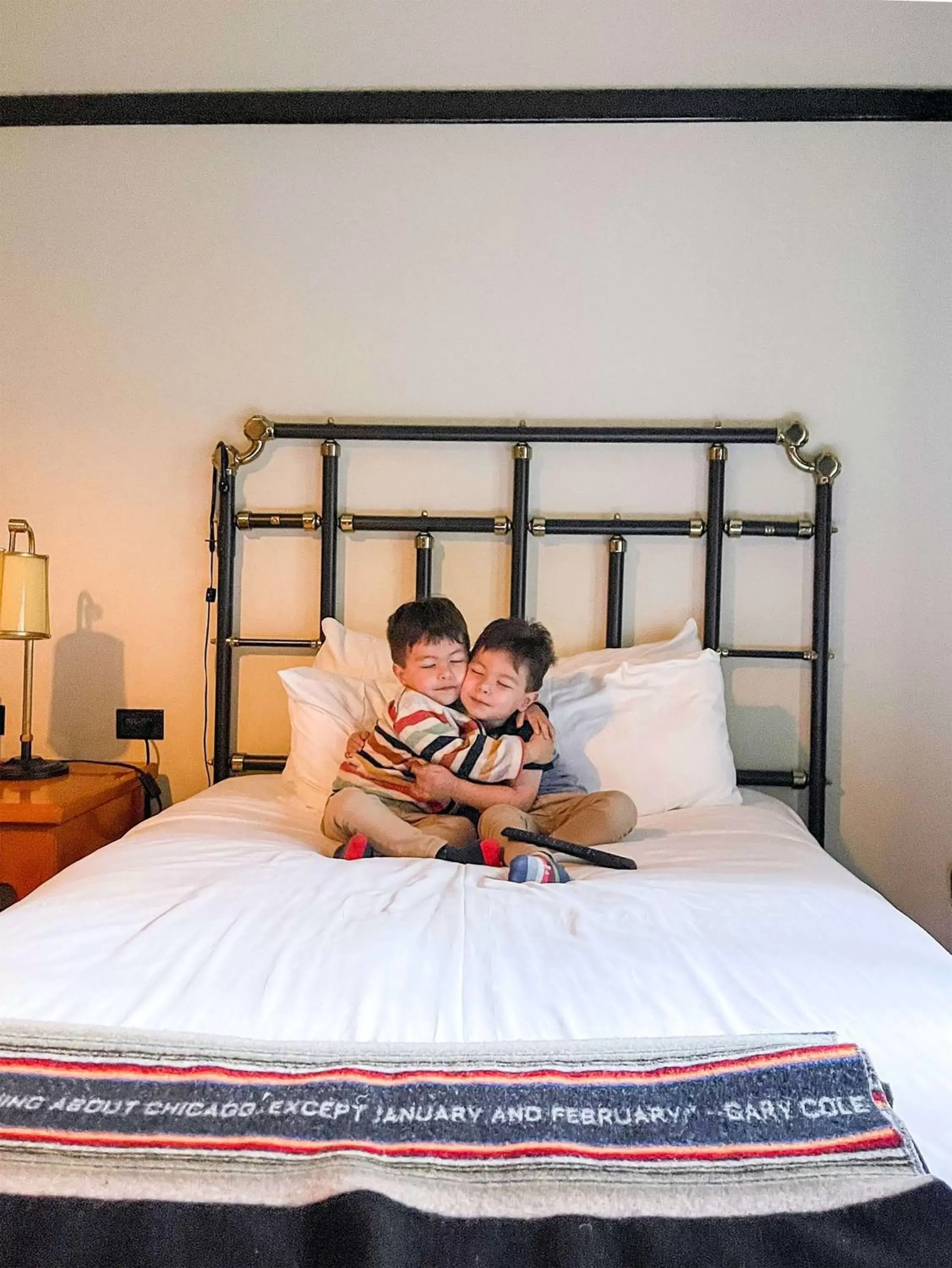 Bed in Chicago Athletic Association, part of Hyatt