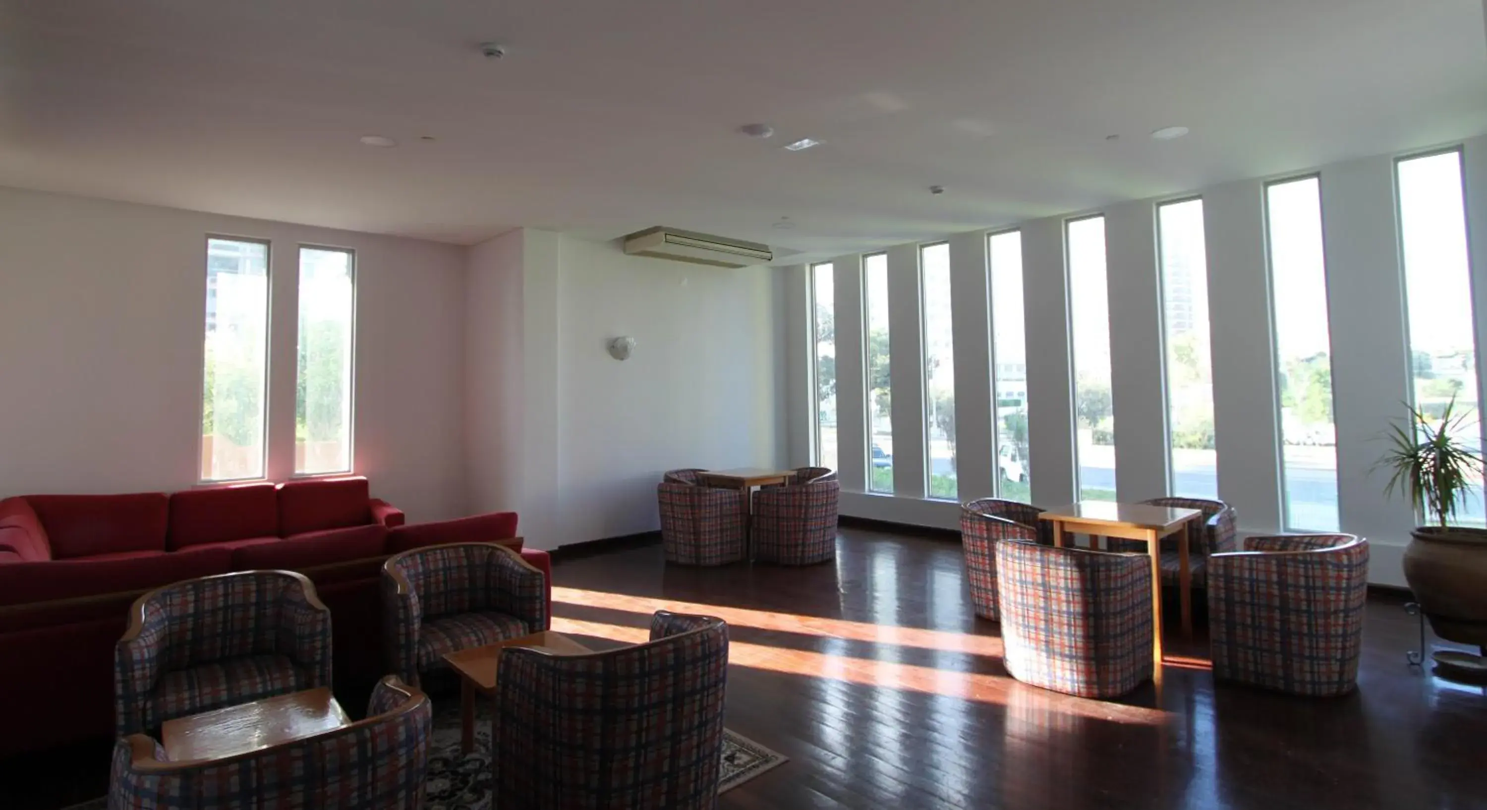 Communal lounge/ TV room, Seating Area in Hotel Luar