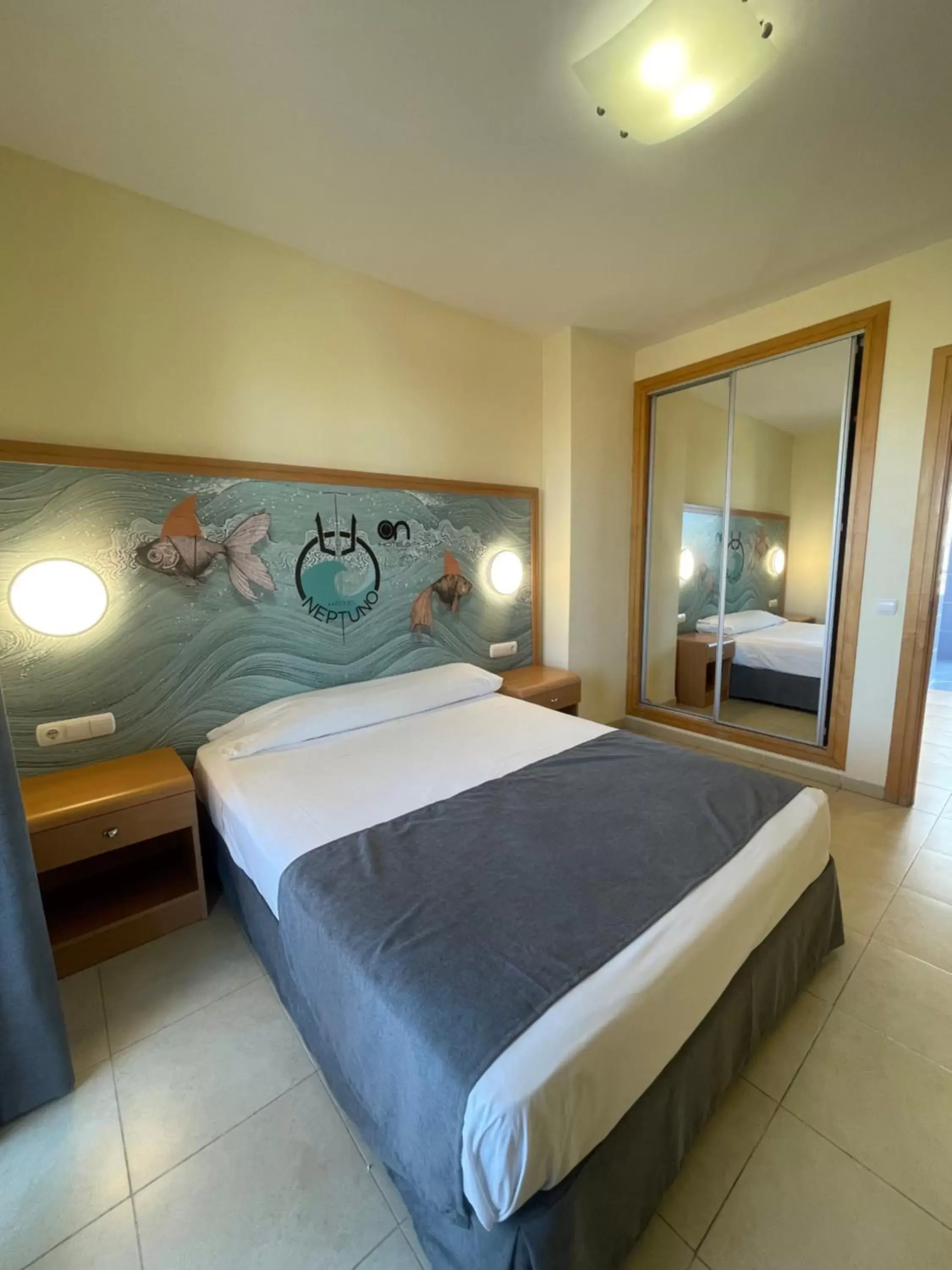 Bed in Hotel Neptuno by ON GROUP